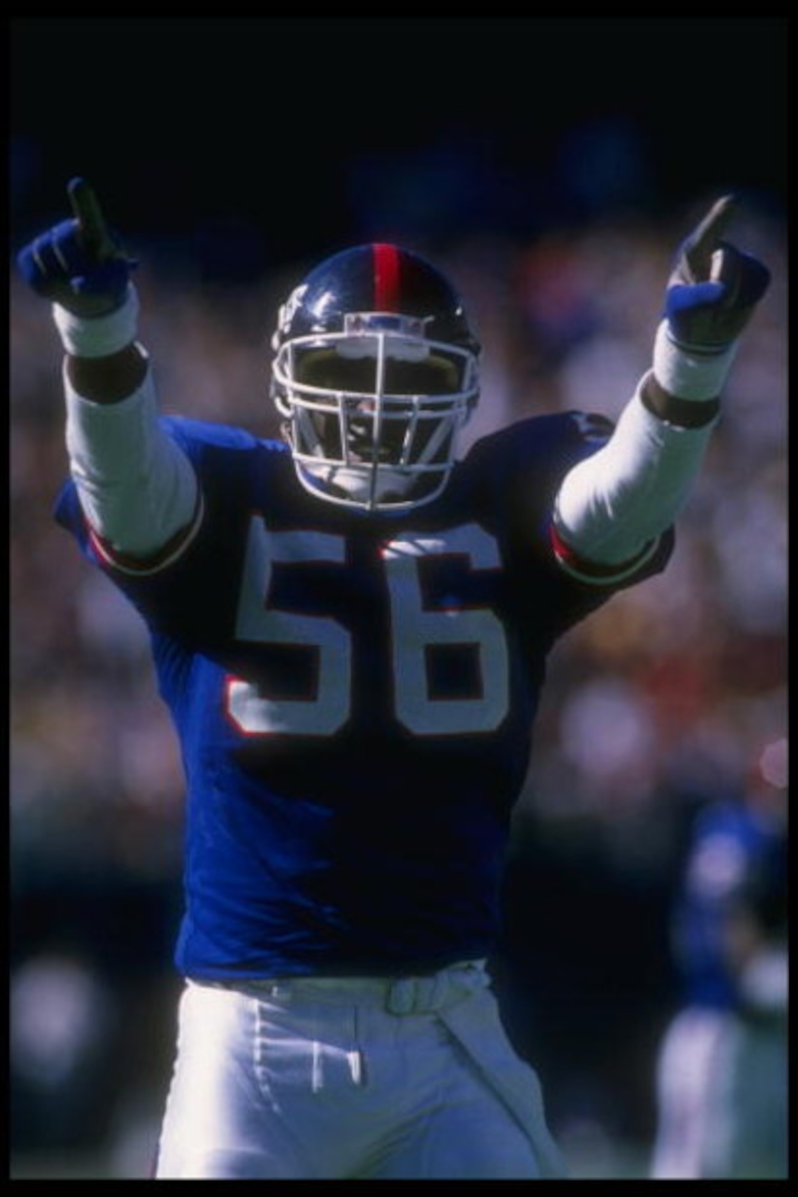 24 Sep 1989:  Linebacker Lawrence Taylor of the New York Giants celebrates during a game against the Phoenix Cardinals at Giants Stadium in East Rutherford, New Jersey.  The Giants won the game, 35-7. Mandatory Credit: T. G. Higgins  /Allsport