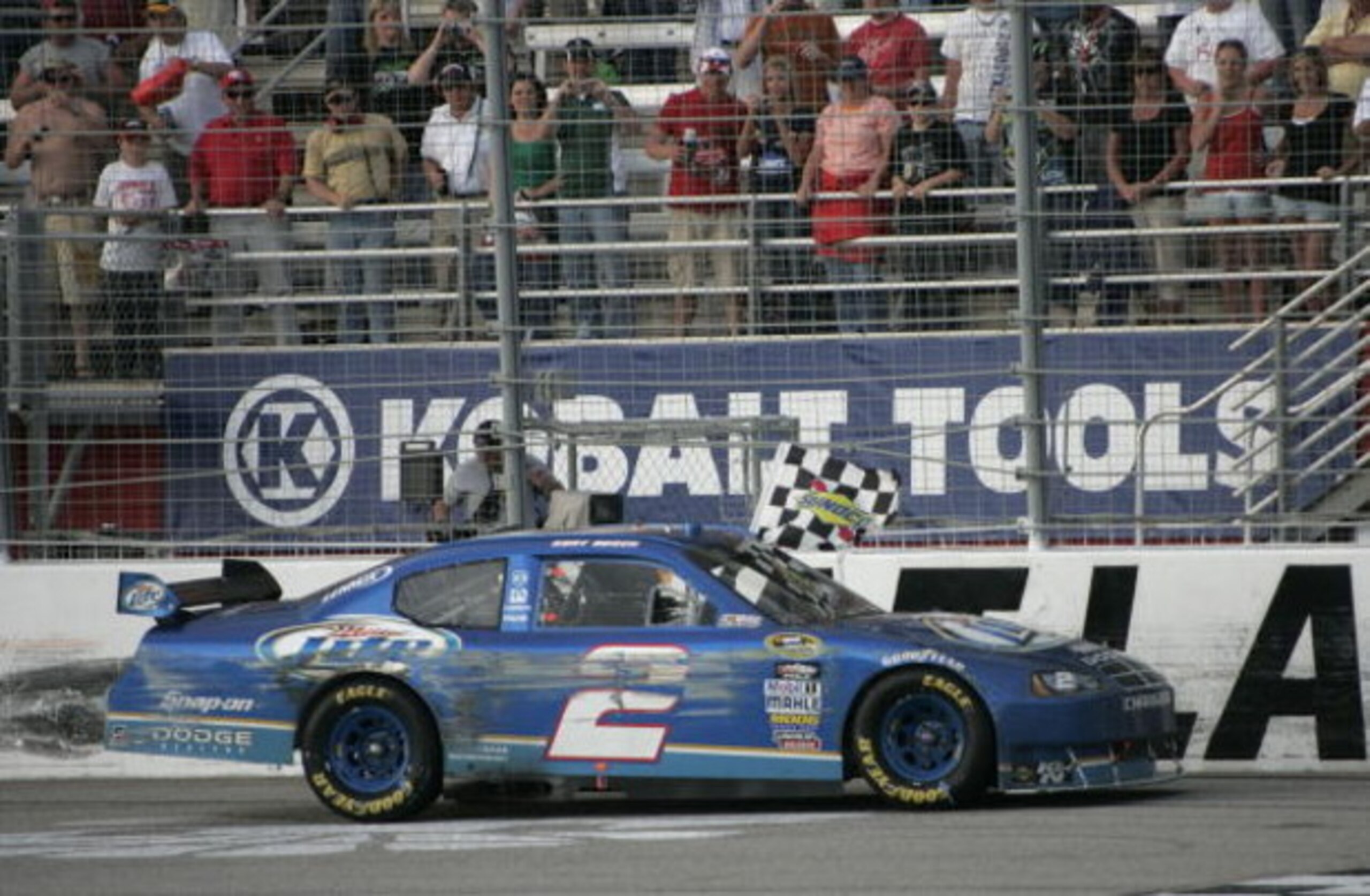 HAMPTON, GA - MARCH 08: Kurt Busch driver of the #2 Miller Lite Dodge celebrates winning the NASCAR Sprint Cup Series Kobalt Tools 500 at the Atlanta Motor Speedway on March 8, 2009 in Hampton, Georgia. (Photo by Jerry Markland/Getty Images for NASCAR) HAMPTON, GA - MARCH 08: Kurt Busch driver of the #2 Miller Lite Dodge celebrates winning the NASCAR Sprint Cup Series Kobalt Tools 500 at the Atlanta Motor Speedway on March 8, 2009 in Hampton, Georgia. (Photo by Jerry Markland/Getty Images for NASCAR)