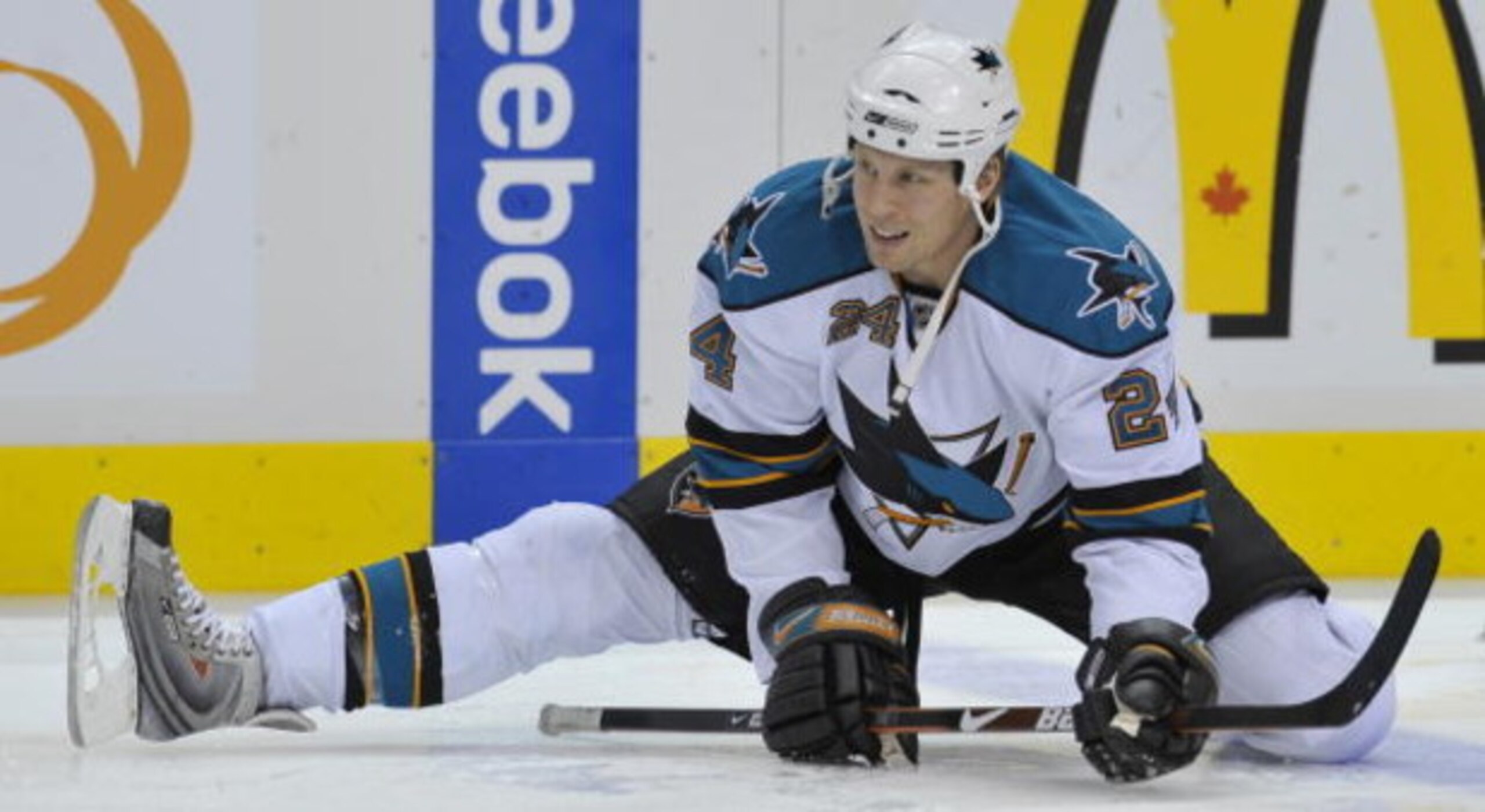 VANCOUVER, CANADA - MARCH 7: Travis Moen #24 of the San Jose Sharks stretches against the Vancouver Canucks on March 7, 2009 at General Motors Place in Vancouver, Canada.   (Photo by Nick Didlick/Getty Images)