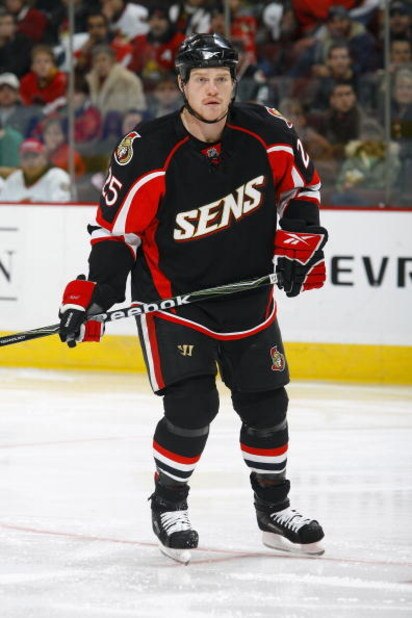 OTTAWA - DECEMBER 8:  Chris Neil #25 of the Ottawa Senators skates during their NHL game against the Florida Panthers on December 8, 2008 at the Scotiabank Place in Ottawa, Canada.  The Panthers defeated the Senators 4-3 in overtime. (Photo by Phillip Mac