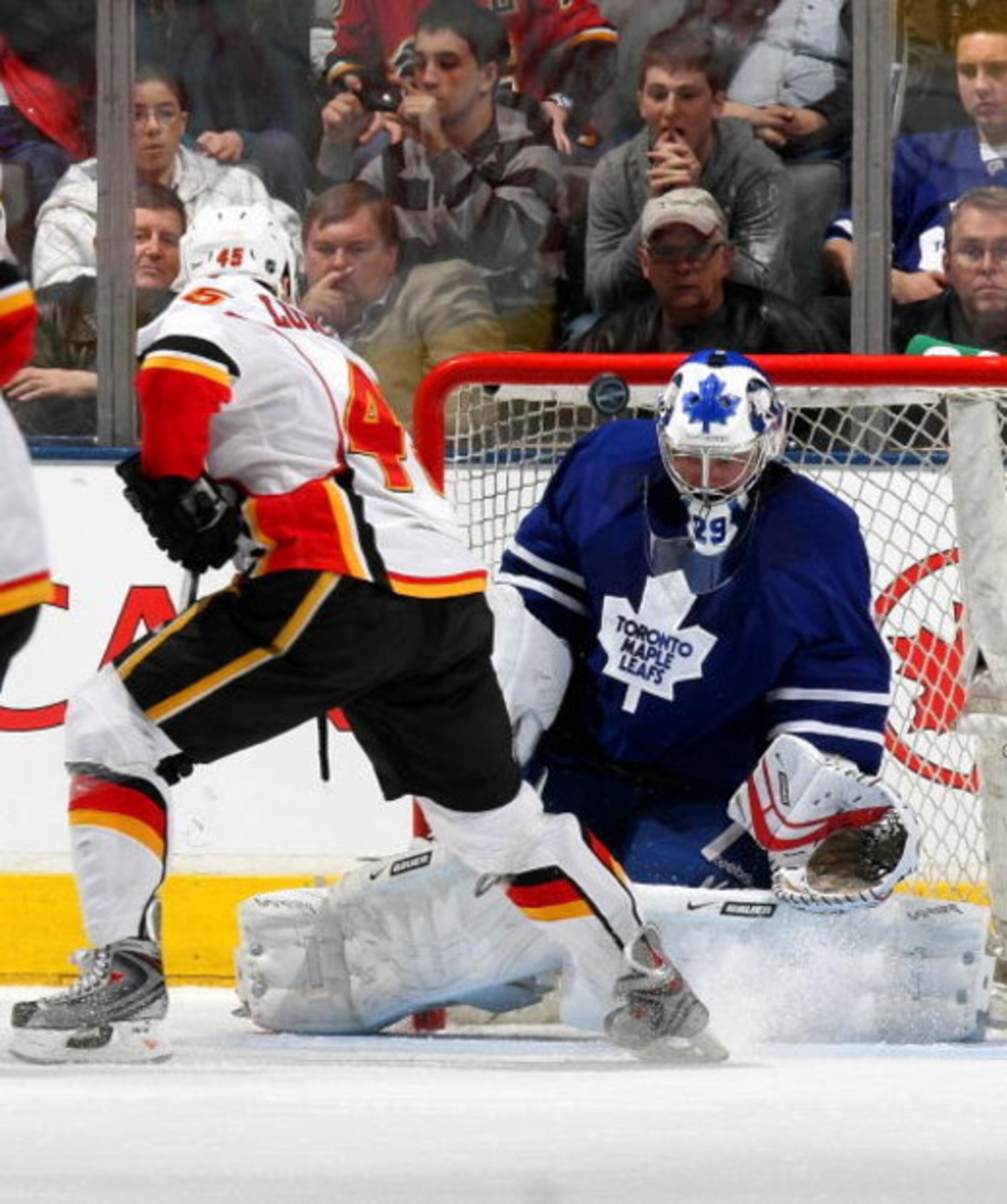 TORONTO - MARCH 14:  Jamie Lundmark #45 of the Calgary Flames is stopped by Martin Gerber #29 of the Toronto Maple Leafs during their NHL game at the Air Canada Centre March 14, 2009 in Toronto, Ontario.(Photo by Dave Sandford/Getty Images)