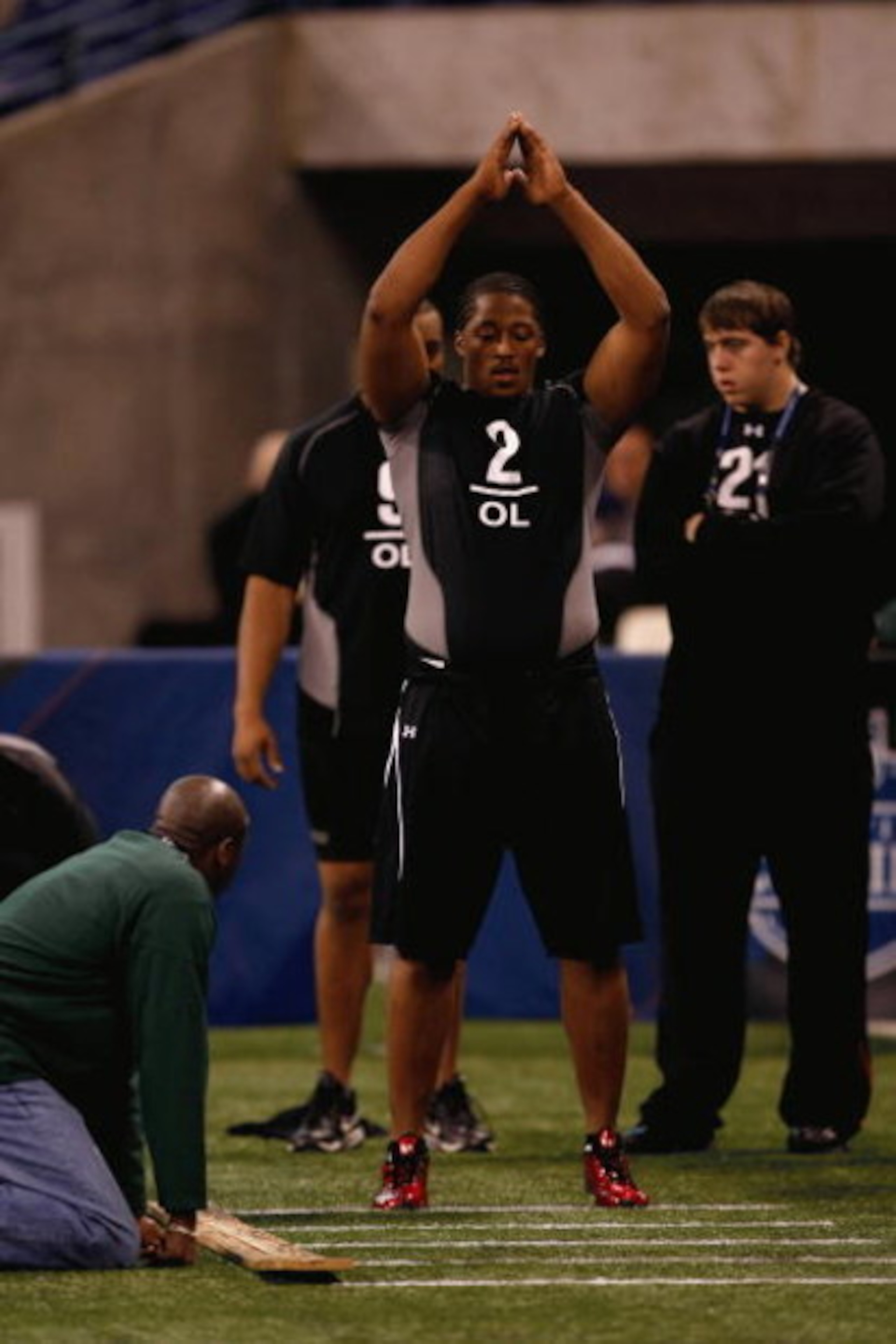 INDIANAPOLIS, IN - FEBRUARY 21:  Offensive lineman Will Beatty of Connecticut jumps in the broad jump as he participates in practice drills during the NFL Scouting Combine presented by Under Armour at Lucas Oil Stadium on February 21, 2009 in Indianapolis