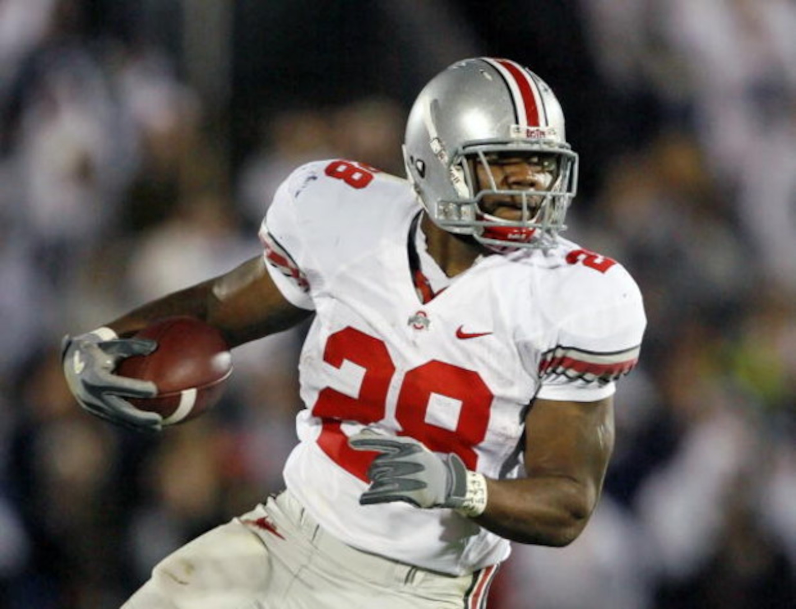 UNIVERSITY PARK, PA - OCTOBER 27: Running back Chris Wells #28 of the Ohio State Buckeyes carries the ball during a game against the Penn State Nittany Lions at Beaver Stadium on October 27, 2007 in University Park, Pennsylvania. Ohio State won 37-17.  (P