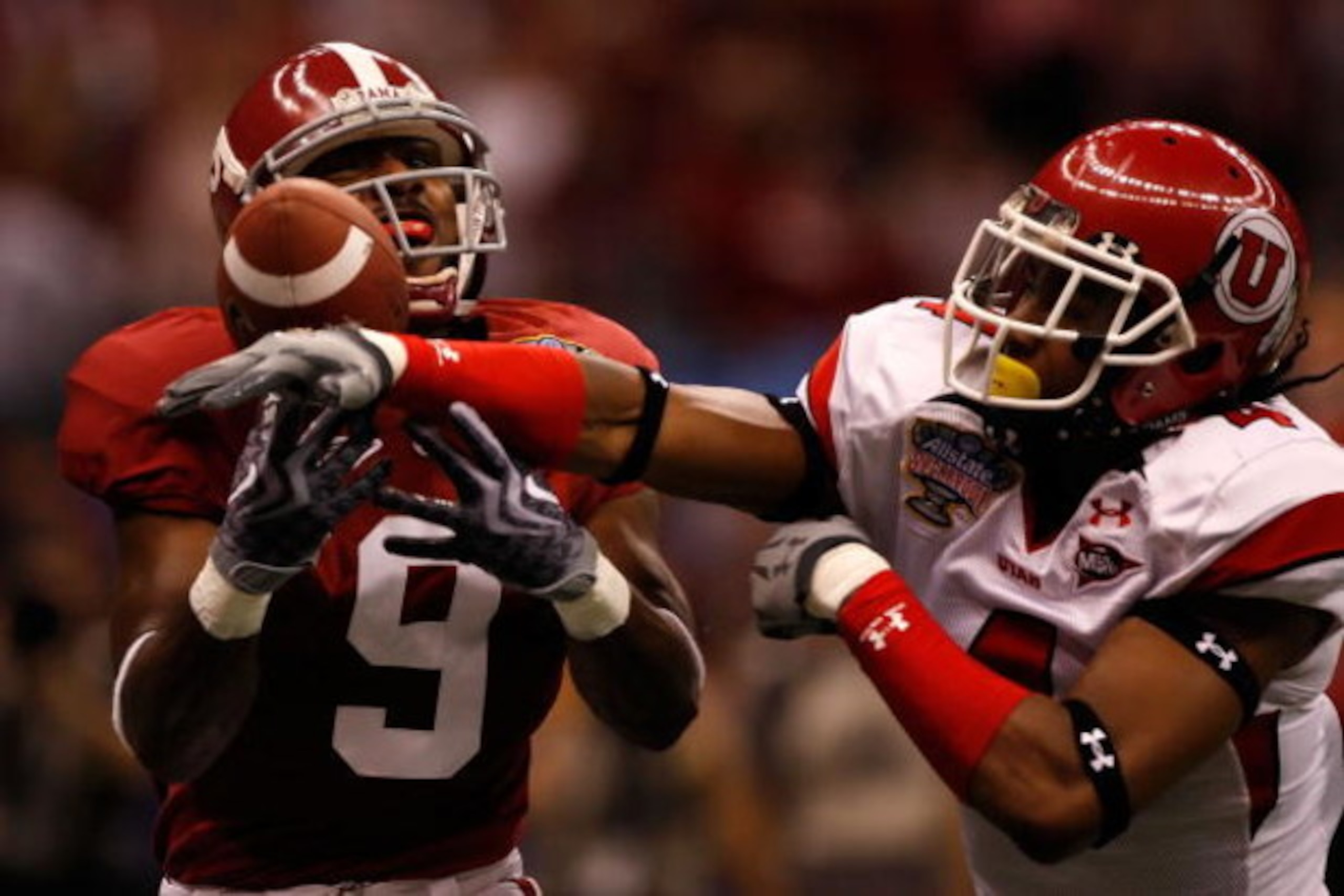 NEW ORLEANS - JANUARY 02:  Wide receiver Nikita Stover #9 of the Alabama Crimson Tide has the catch broken up by cornerback Sean Smith #4 of the Utah Utes in the second quarter during the 75th Allstate Sugar Bowl at the Louisiana Superdome on January 2, 2