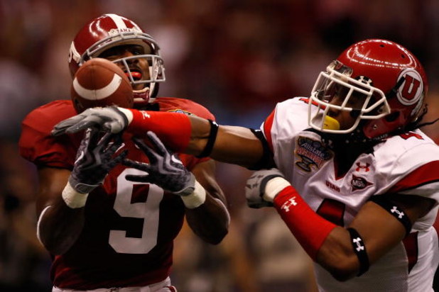 NEW ORLEANS - JANUARY 02:  Wide receiver Nikita Stover #9 of the Alabama Crimson Tide has the catch broken up by cornerback Sean Smith #4 of the Utah Utes in the second quarter during the 75th Allstate Sugar Bowl at the Louisiana Superdome on January 2, 2