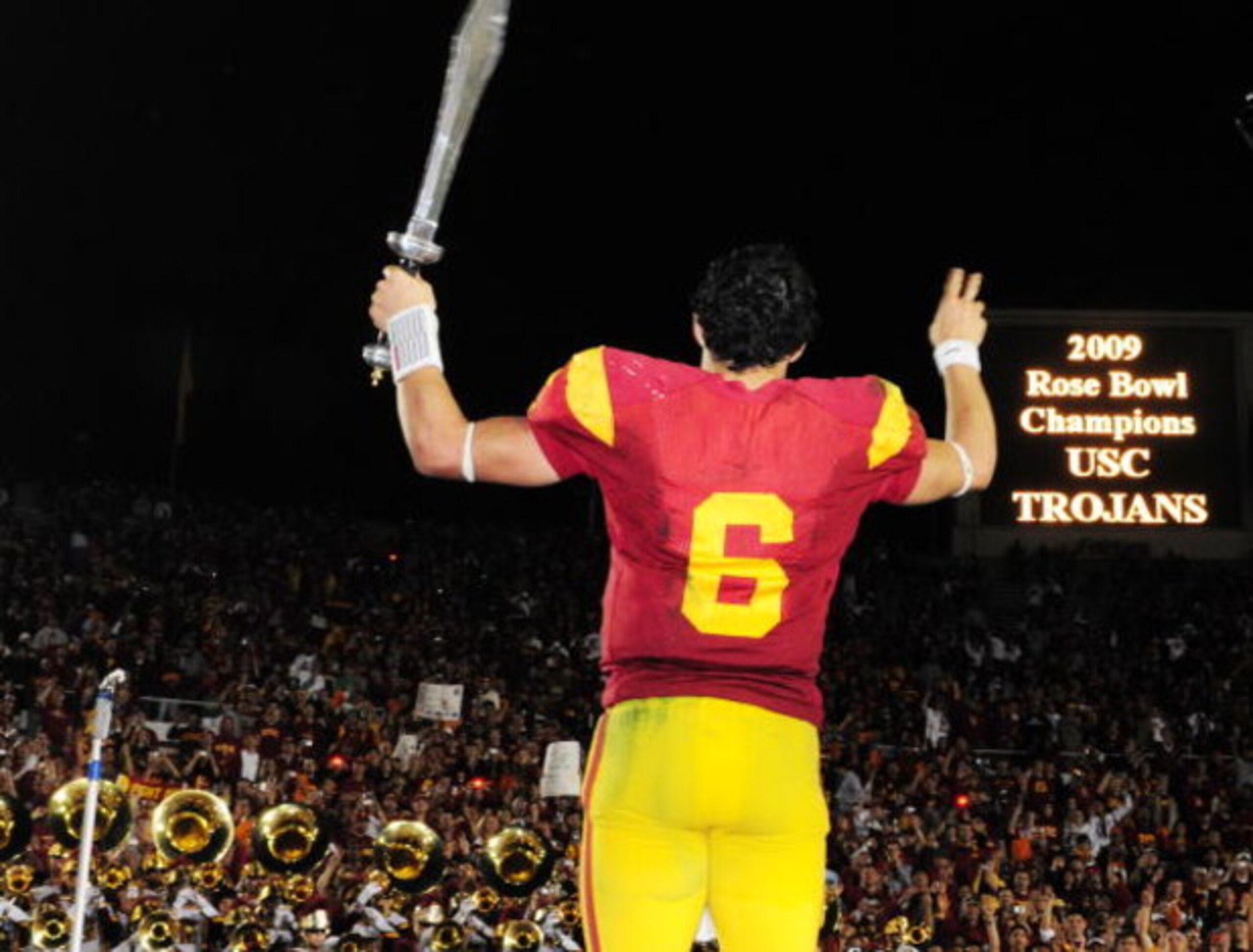 PASADENA, CA - JANUARY 01: Quarterback Mark Sanchez #6 of the USC Trojans leads the USC band after the 95th Rose Bowl Game presented by Citi against the Penn State Nittany Lions at the Rose Bowl on January 1, 2009 in Pasadena, California. The Trojans defe