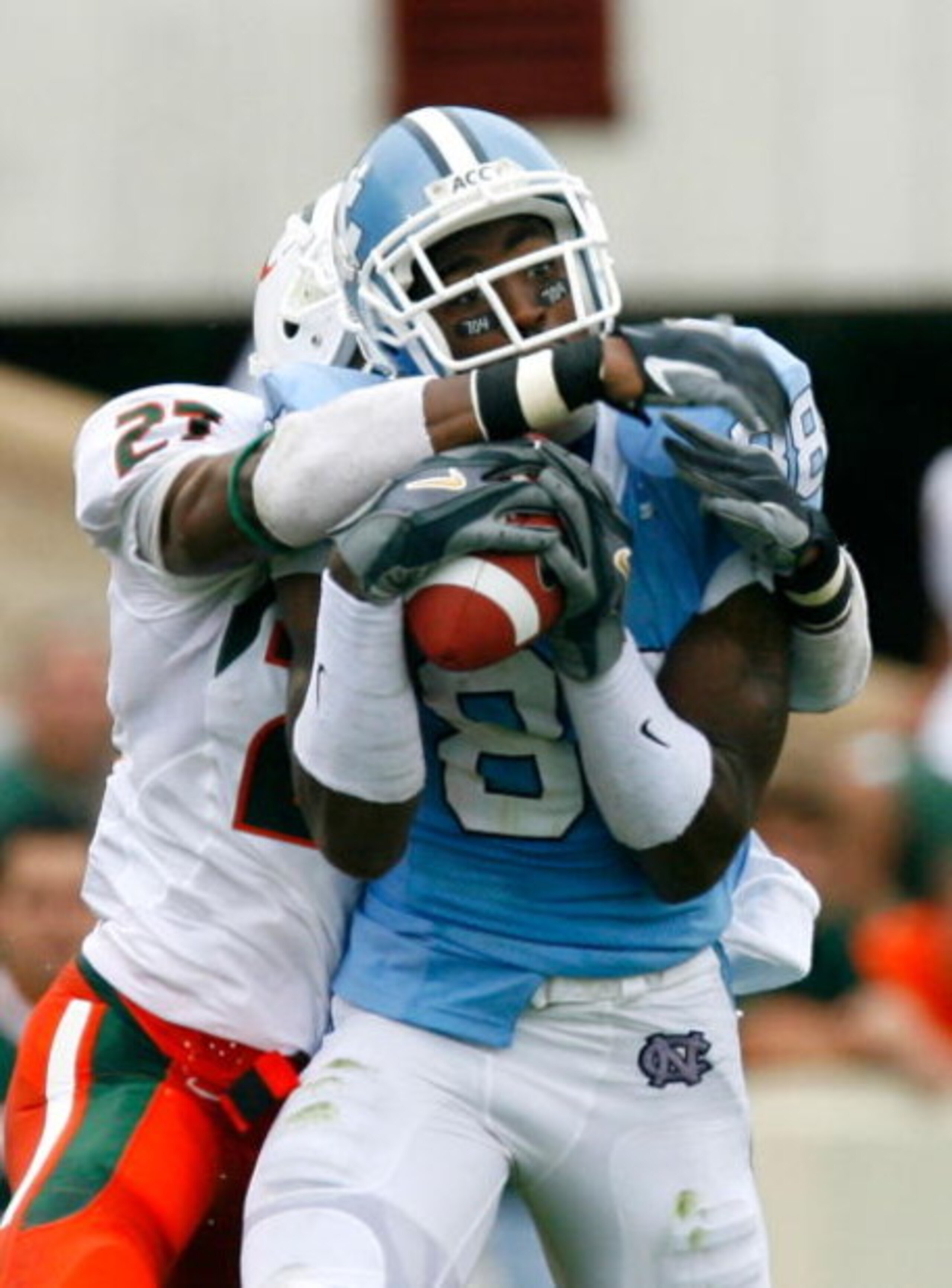 CHAPEL HILL, NC - OCTOBER 06:  Receiver Hakeem Nicks 88# of the North Carolina Tar Heels pulls in this reception against cornerback Carlos Armour #27 of the Miami Hurricanes during the first half at Kenan Stadium on October 6, 2007 in Chapel Hill, North C