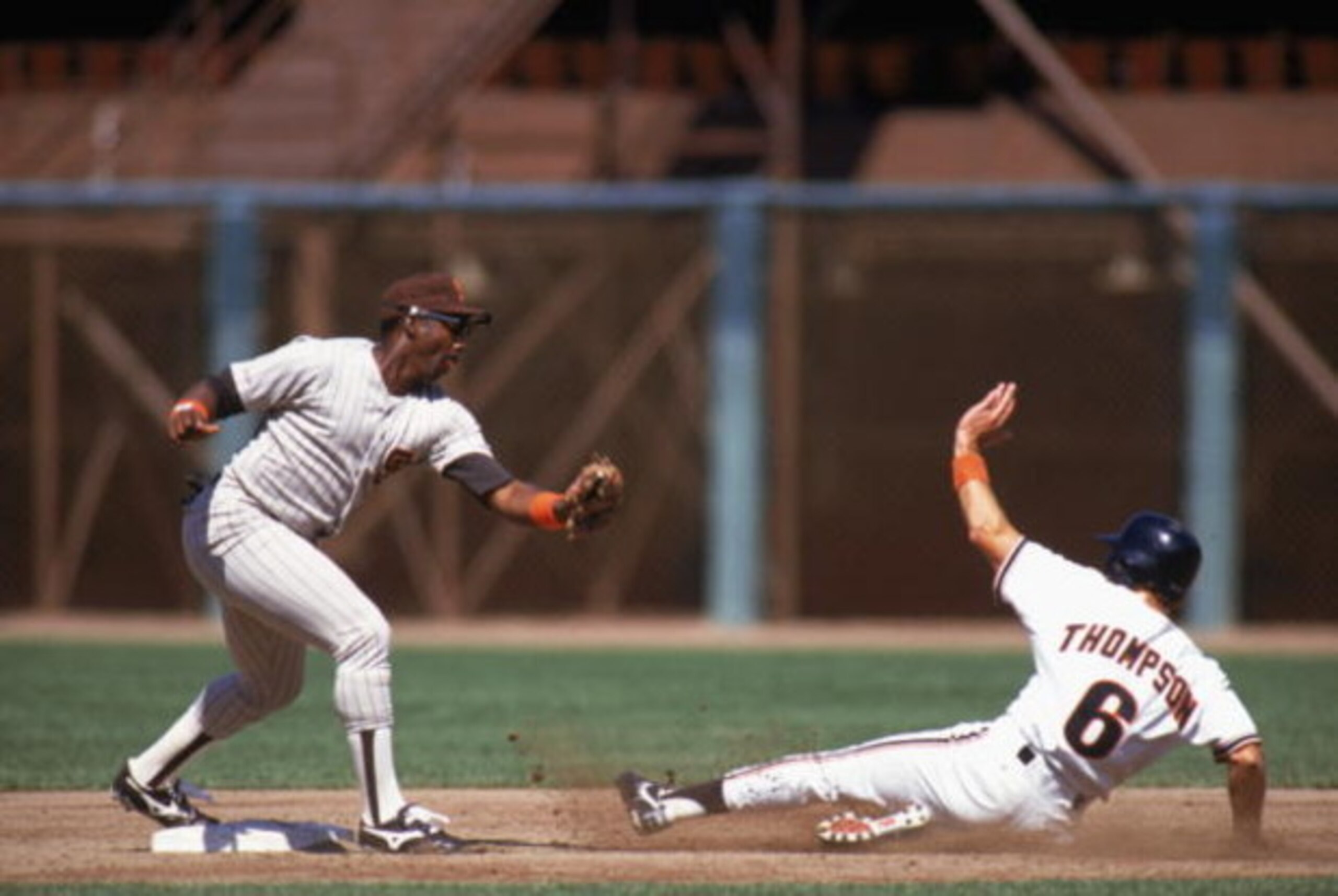 1990:  Garry Templeton of the San Diego Padres goes for the tag during the 1990 season. (Photo by Otto Greule Jr/Getty Images)