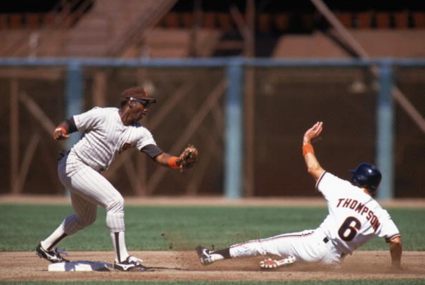 1990:  Garry Templeton of the San Diego Padres goes for the tag during the 1990 season. (Photo by Otto Greule Jr/Getty Images)