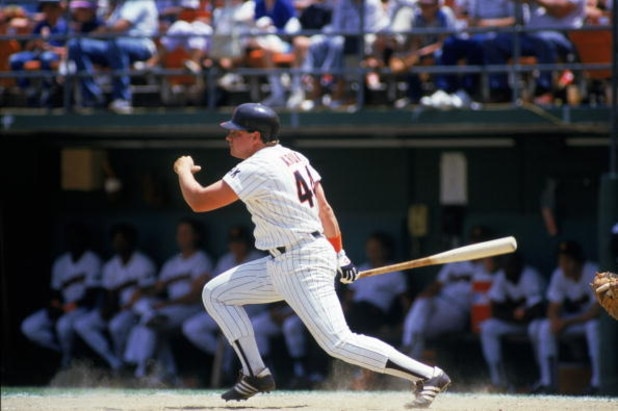 SAN DIEGO - 1986:  John Kruk #44 of the San Diego Padres watches the flight of his hit during a 1986 season game at Jack Murphy Stadium in San Diego, California. (Photo by Stephen Dunn/Getty Images)