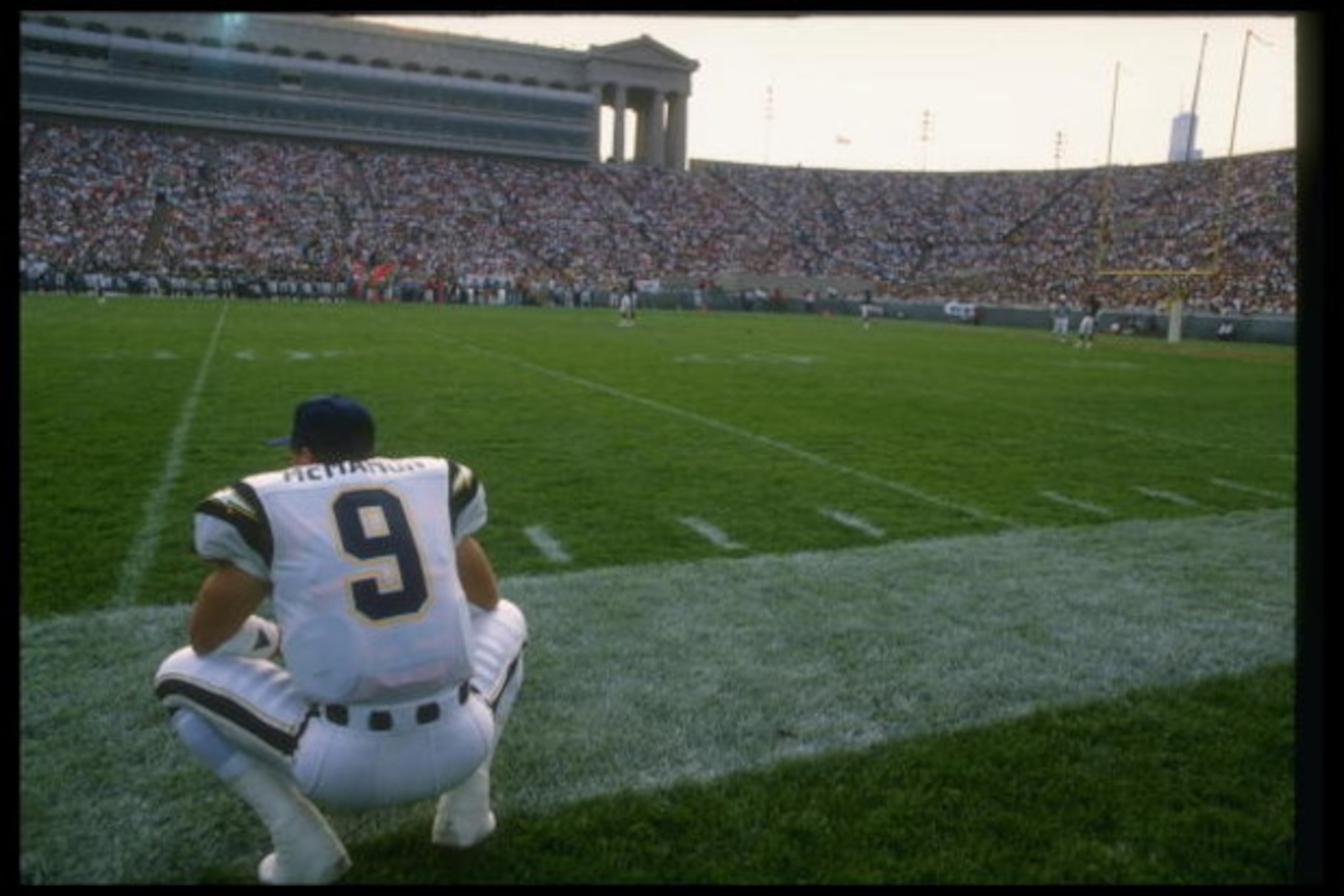 1989:  Quarterback Jim McMahon of the San Diego Chargers looks on during a game against the Chicago Bears at Soldier Field in Chicago, Illinois. Mandatory Credit: Jonathan Daniel  /Allsport