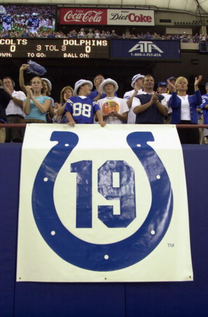 INDIANAPOLIS - SEPTEMBER 15:  Fans cheer above a banner in memory of former Baltimore Colts quarterback Johnny Unitas who passed away this past week before the Indianapolis Colts take on the Miami Dolphins on September 15, 2002 at the RCA Dome in Indianap