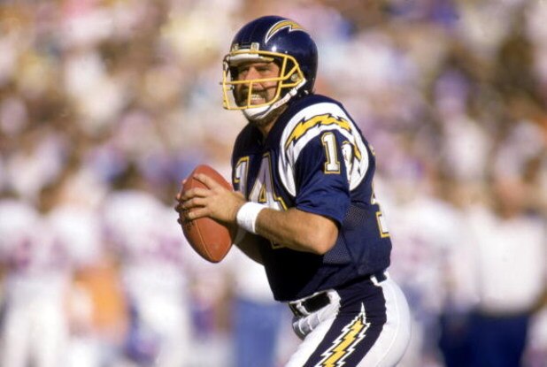 1987:  Quarterback Dan Fouts #14 of the San Diego Chargers looks to pass during a 1987 NFL game.  (Photo by Stephen Dunn/Getty Images)