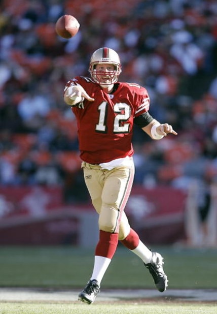 SAN FRANCISCO - AUGUST 13:  Quarterback Trent Dilfer #12 of the San Francisco 49ers tosses a pass in a pre-season game at Monster Park August 13, 2007 in San Francisco, California.  (Photo by Greg Trott/Getty Images)