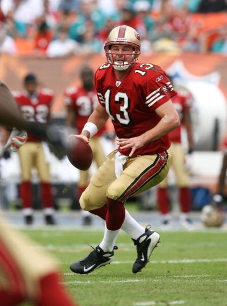 MIAMI - DECEMBER 14:  Quarterback Shaun Hill #13 of the San Francisco 49ers drops back to pass against the Miami Dolphins at Dolphin Stadium on December 14, 2008 in Miami, Florida. The Dolphins defeated the 49ers 14-9.  (Photo by Doug Benc/Getty Images)