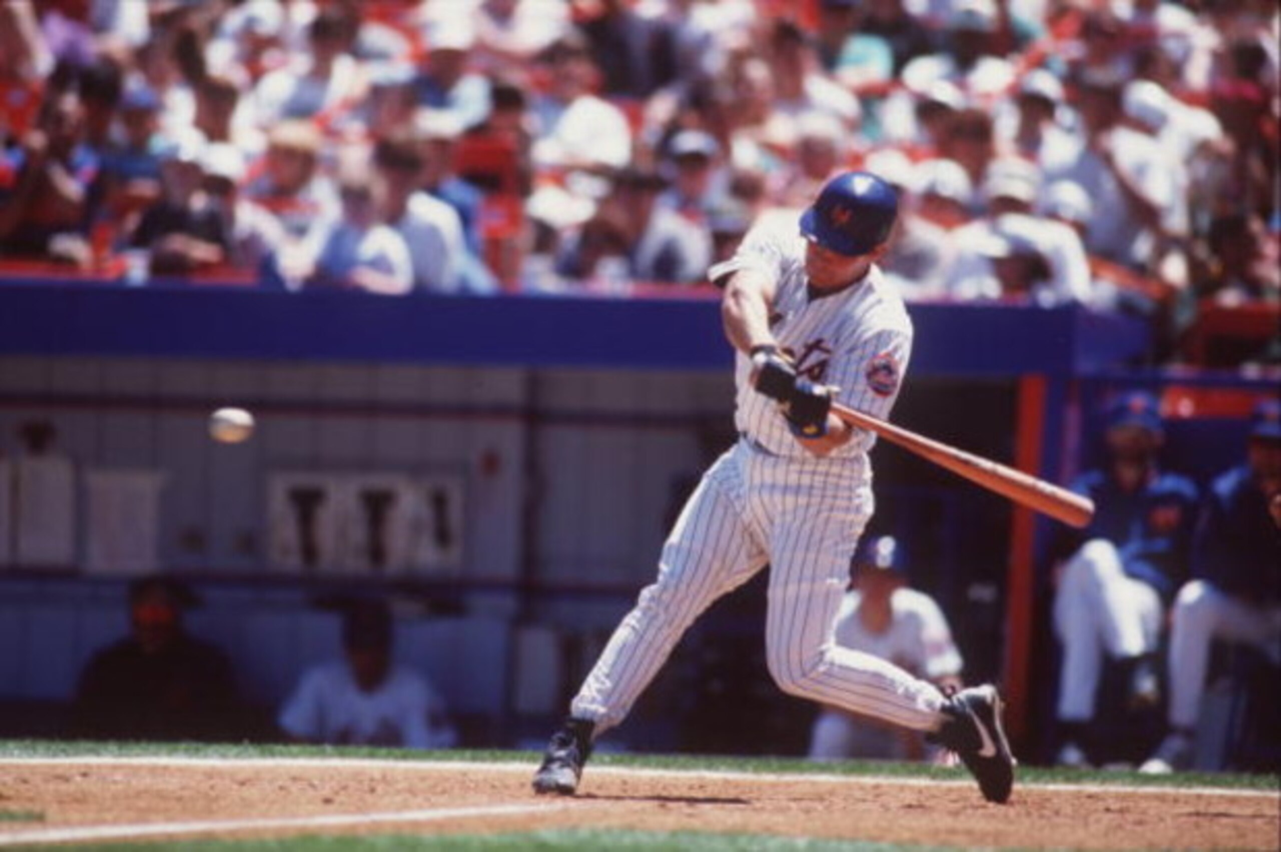 25 May 1996: Catcher Todd Hundley of the New York Mets swings at a pitch during the Mets 7-2 loss to the San Diego Padres at Shea Stadium in New York, New York.