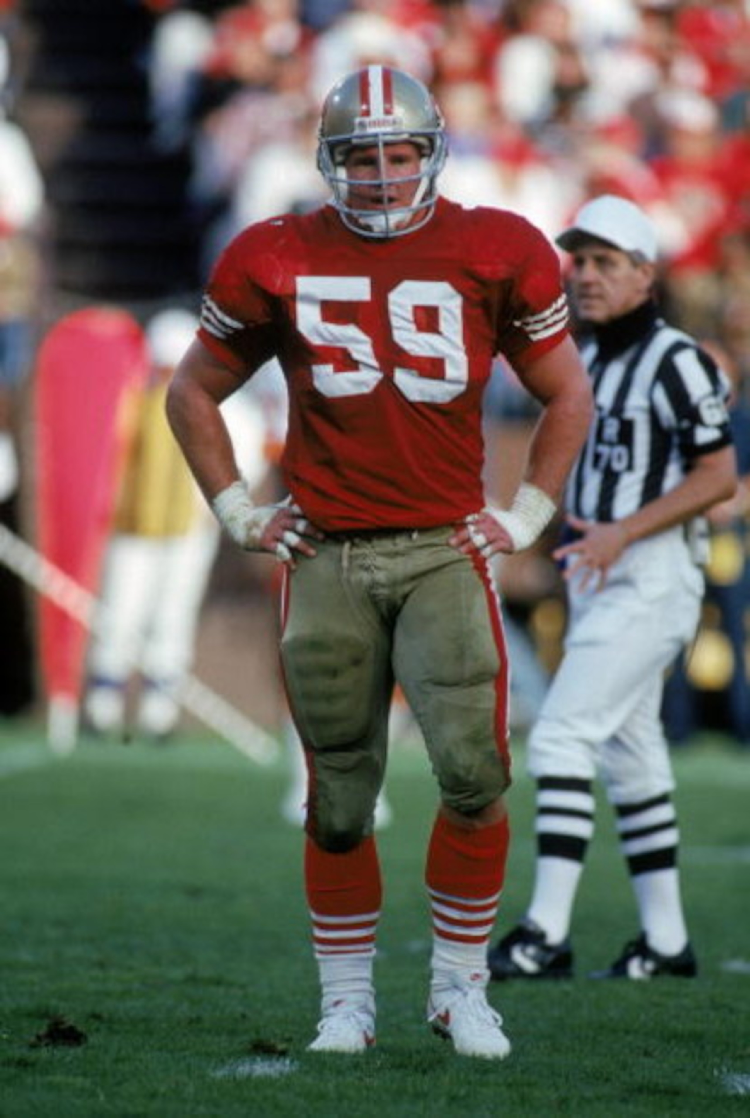 SAN FRANCISCO - NOVEMBER 18: Inside linebacker Keith DeLong #59 of the San Francisco 49ers stands on the field during a game against the Tampa Bay Buccaneers at Candlestick Park on November 18, 1990 in San Francisco, California. The 49ers won 31-7. (Ph SAN FRANCISCO - NOVEMBER 18: Inside linebacker Keith DeLong #59 of the San Francisco 49ers stands on the field during a game against the Tampa Bay Buccaneers at Candlestick Park on November 18, 1990 in San Francisco, California. The 49ers won 31-7. (Ph
