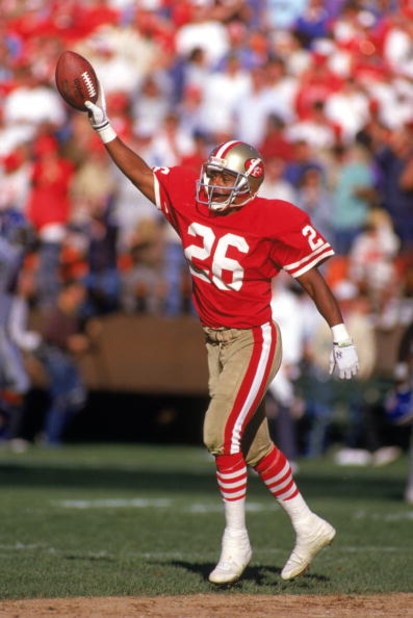 SAN FRANCISCO - OCTOBER 9:  Cornerback Darryl Pollard #26 of the San Francisco 49ers celebrates after a play during a game against the Denver Broncos at Candlestick Park on October 9, 1988 in San Francisco, California.  The Broncos won 16-13 in overtime. 