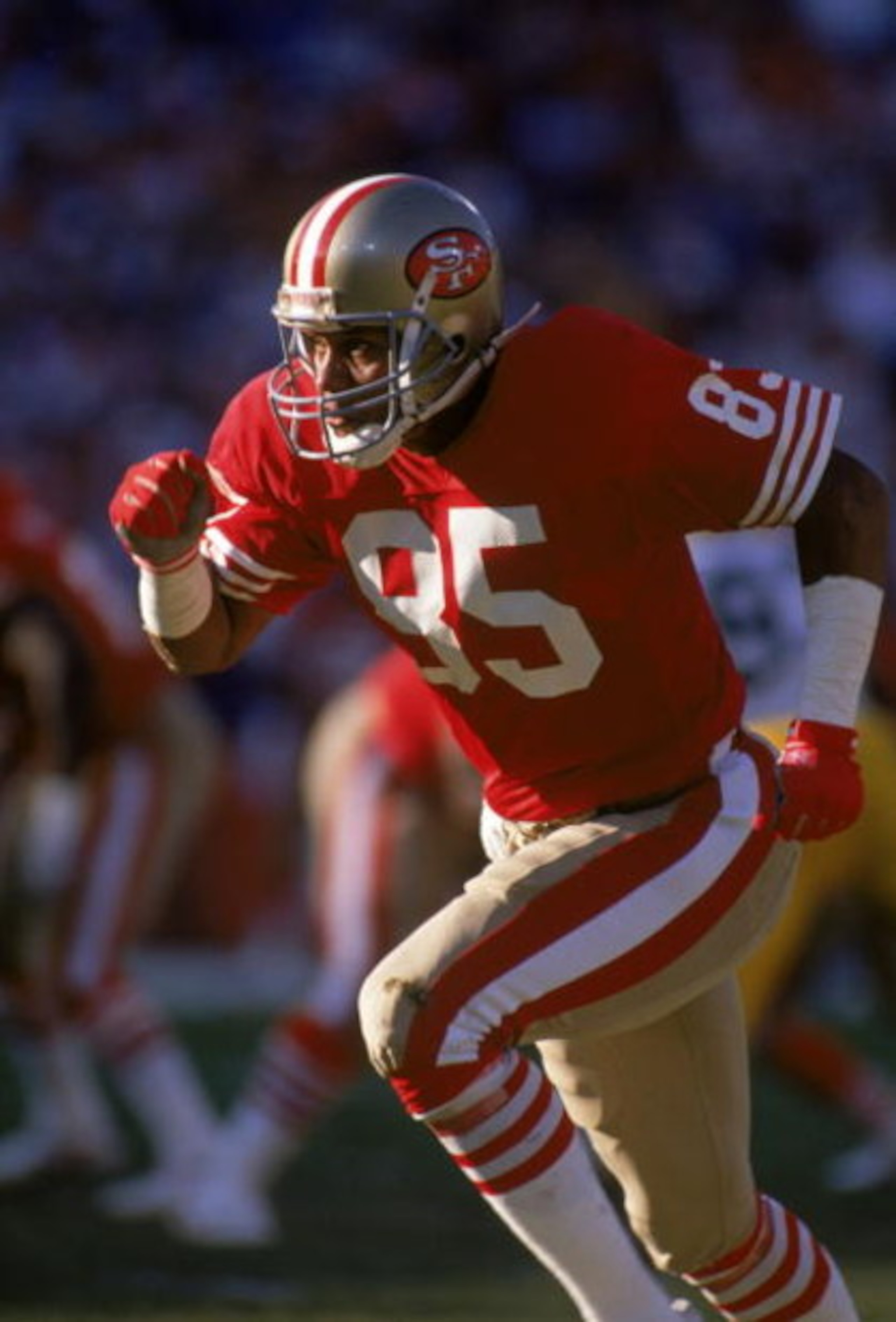 SAN FRANCISCO - NOVEMBER 19: Wide receiver Mike Wilson #85 of the San Francisco 49ers runs up field during a game against the Green Bay Packers at Candlestick Park on November 19, 1989 in San Francisco, California. The Packers won 21-17. (Photo by Geor SAN FRANCISCO - NOVEMBER 19: Wide receiver Mike Wilson #85 of the San Francisco 49ers runs up field during a game against the Green Bay Packers at Candlestick Park on November 19, 1989 in San Francisco, California. The Packers won 21-17. (Photo by Geor