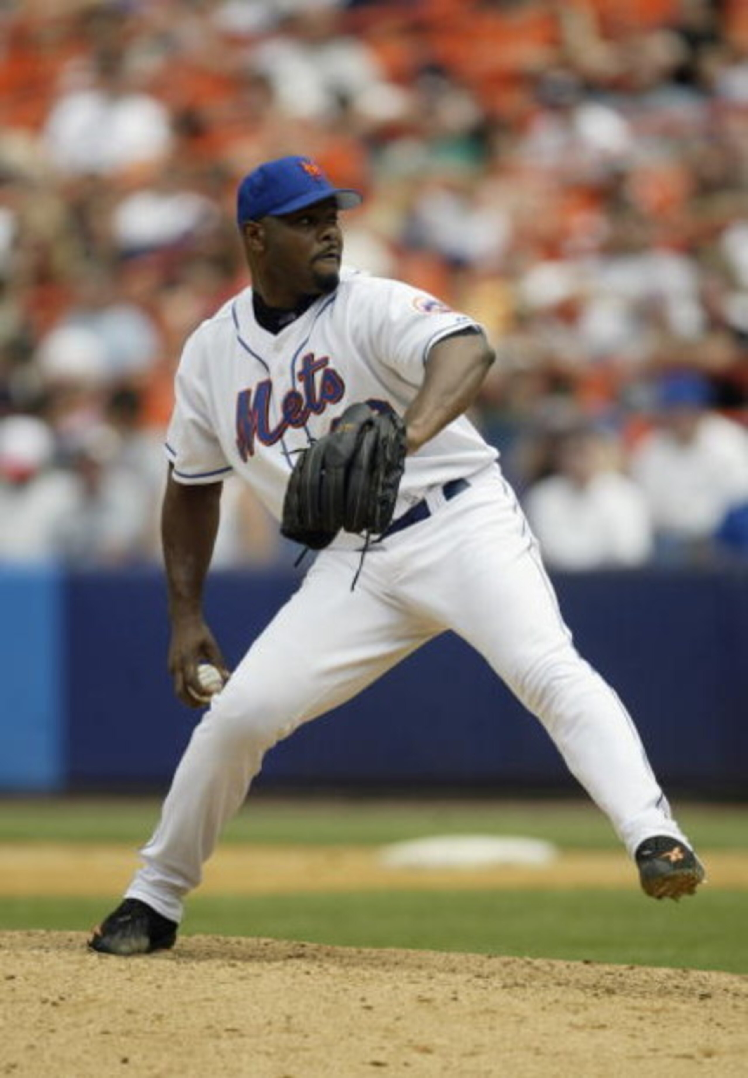 FLUSHING, NY - JULY 12:  Armando Benitez #49 of the New York Mets pitches against the Philadelphia Phillies on July 12, 2003 at Shea Stadium in Flushing, New York.  The Phillies defeated the Mets in 11 innings 4-2.  (Photo by Chris Trotman/Getty Images)
