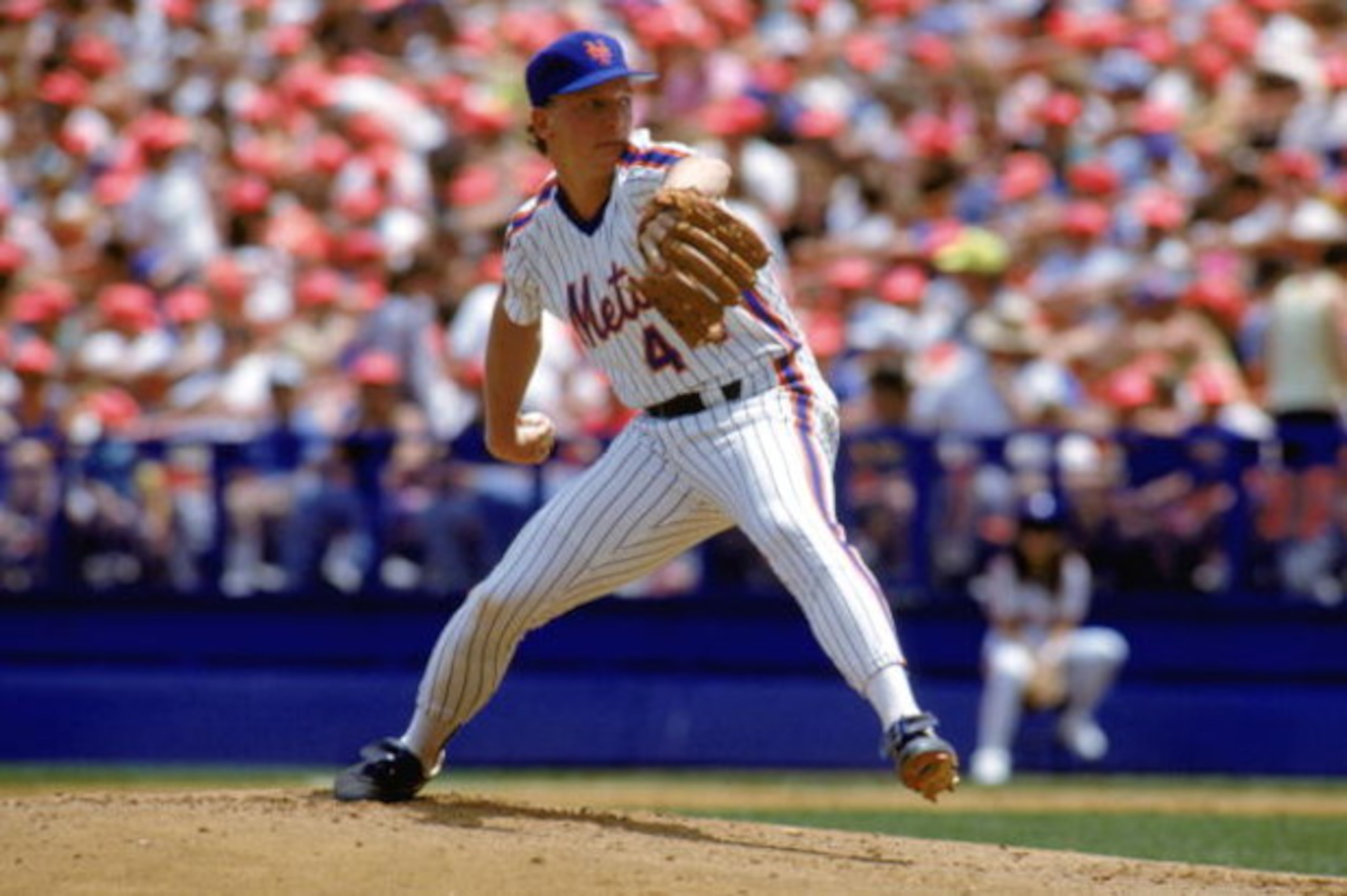 1990:  David Cone of the New York Mets winds back to pitch during a game in the 1990 season. ( Photo by: Scott Halleran/Getty Images)