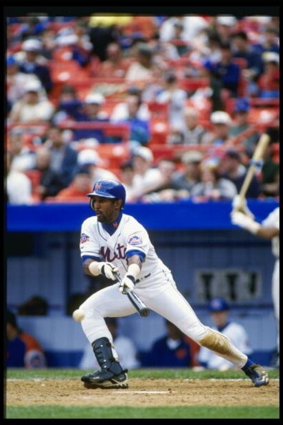 13 Apr 1997: Lance Johnson of the New York Mets bunts the ball during the Mets 5-1 loss to the San Francisco Giants at Shea Stadium in Flushing, New York.
