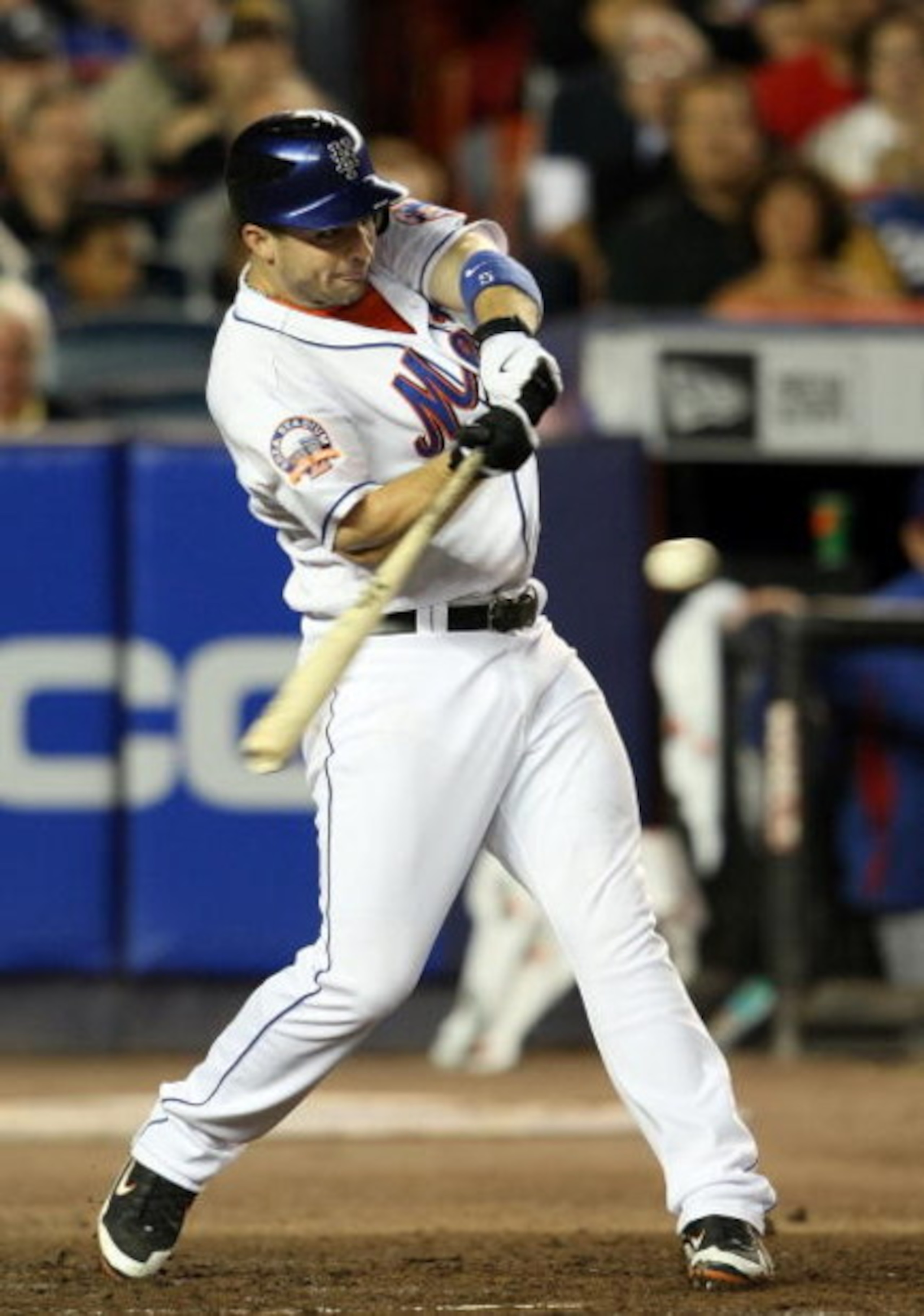 NEW YORK - SEPTEMBER 23: David Wright #5 of the New York Mets hits a two RBI single in the fifth inning against the Chicago Cubs during their game at Shea Stadium September 23, 2008 in the  Flushing neighborhood of Queens borough of New York City.  (Photo