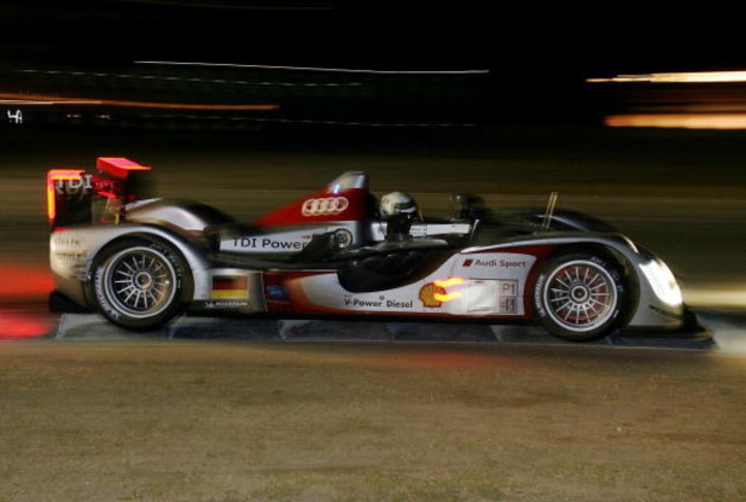 SEBRING, FL - MARCH 21:  Allan McNish driver of the #2 Audi Sport Team Joest Audi R15 TDI gets through turn seven during the 57th Annual Mobil1 12 Hours of Sebring at Sebring International Raceway on March 21, 2009 in Sebring, Florida.  (Photo by Doug Ben