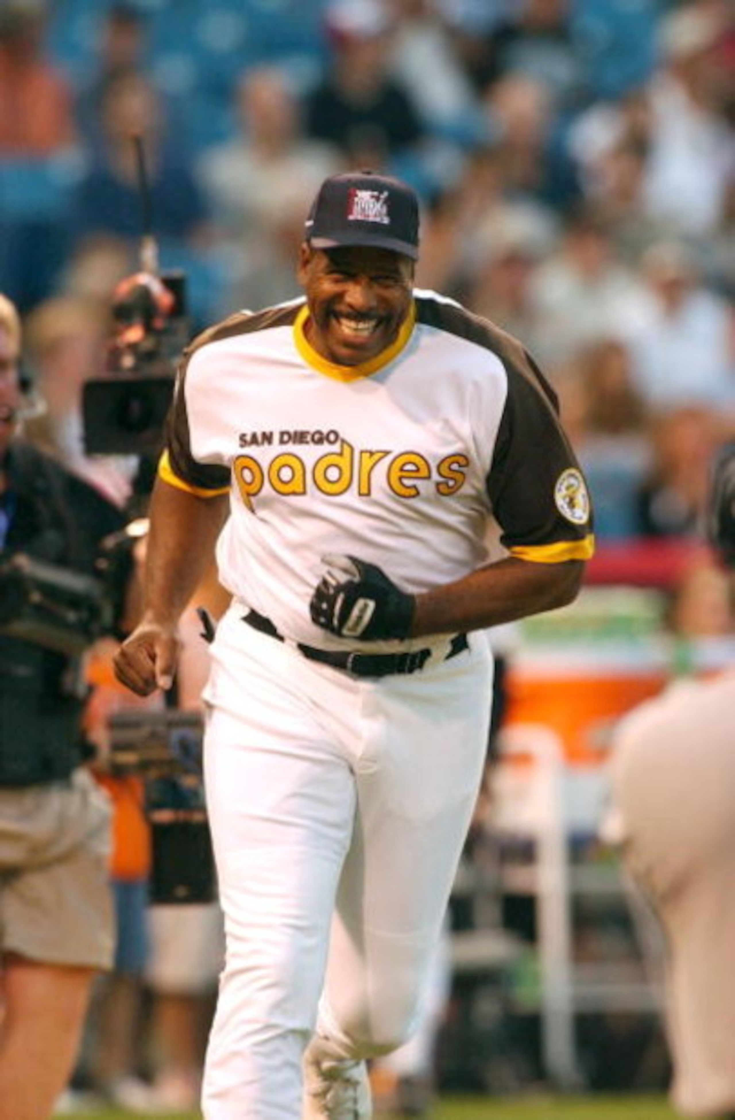 CHICAGO - JULY 13:  Former Major League Baseball star Dave Winfield smiles after hitting a home run during the All Star Legends and Celebrity Softball Game on July 13, 2003 at U.S. Cellular Field in Chicago, Illinois.  (Photo by Jonathan Daniel/Getty Imag