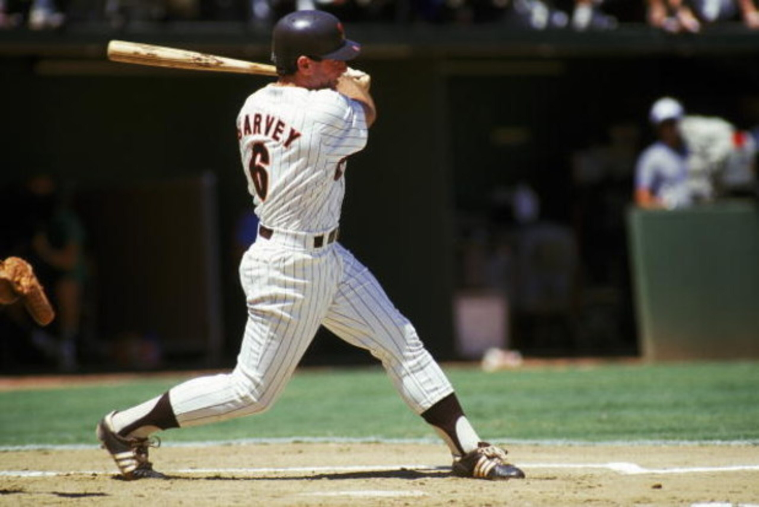 SAN DIEGO, CA - 1986:  Steve Garvey #6 of the San Diego Padres follows through on the swing during a 1986 season game at Jack Murphy Stadium in San Diego, California. (Photo by Stephen Dunn/Getty Images)