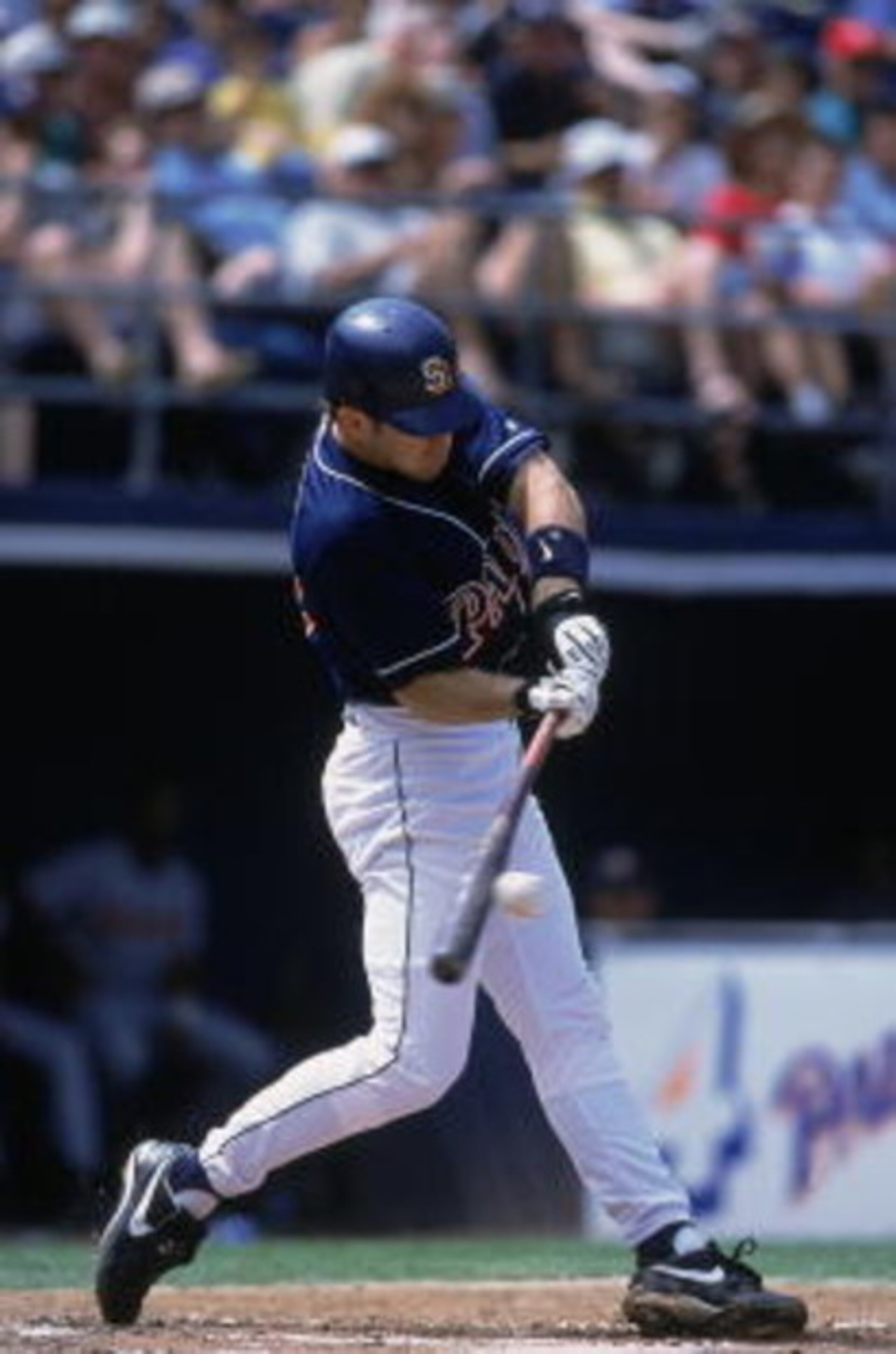 31 May 2001:  Chris Gomez #10 of the San Diego Padres swings at the ball during the game against the Houston Astros at Qualcomm Stadium in San Diego, California. The Astros defeated the Padres 8-4.Mandatory Credit: Todd Warshaw  /Allsport