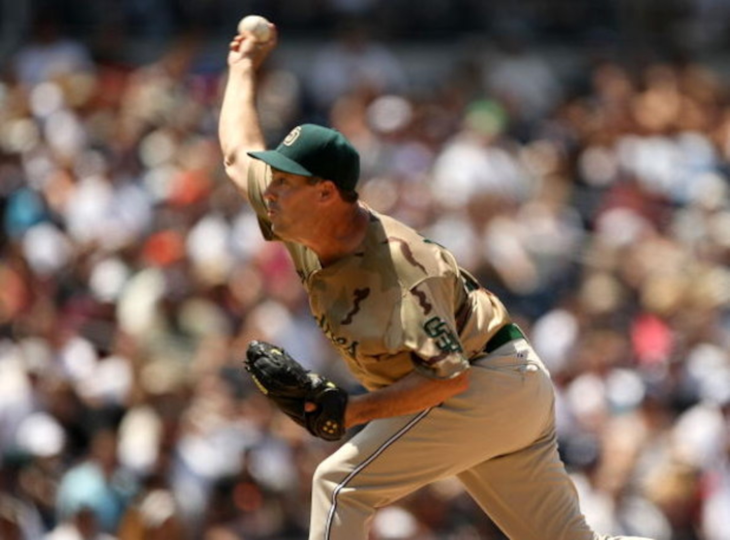 SAN DIEGO - AUGUST 3:  Pitcher Greg Maddux #30 of the San Diego Padres throws a pitch against the San Francisco Giants at Petco Park on August 3, 2008 in San Diego, California. The Padres won 4-1.  (Photo by Stephen Dunn/Getty Images)