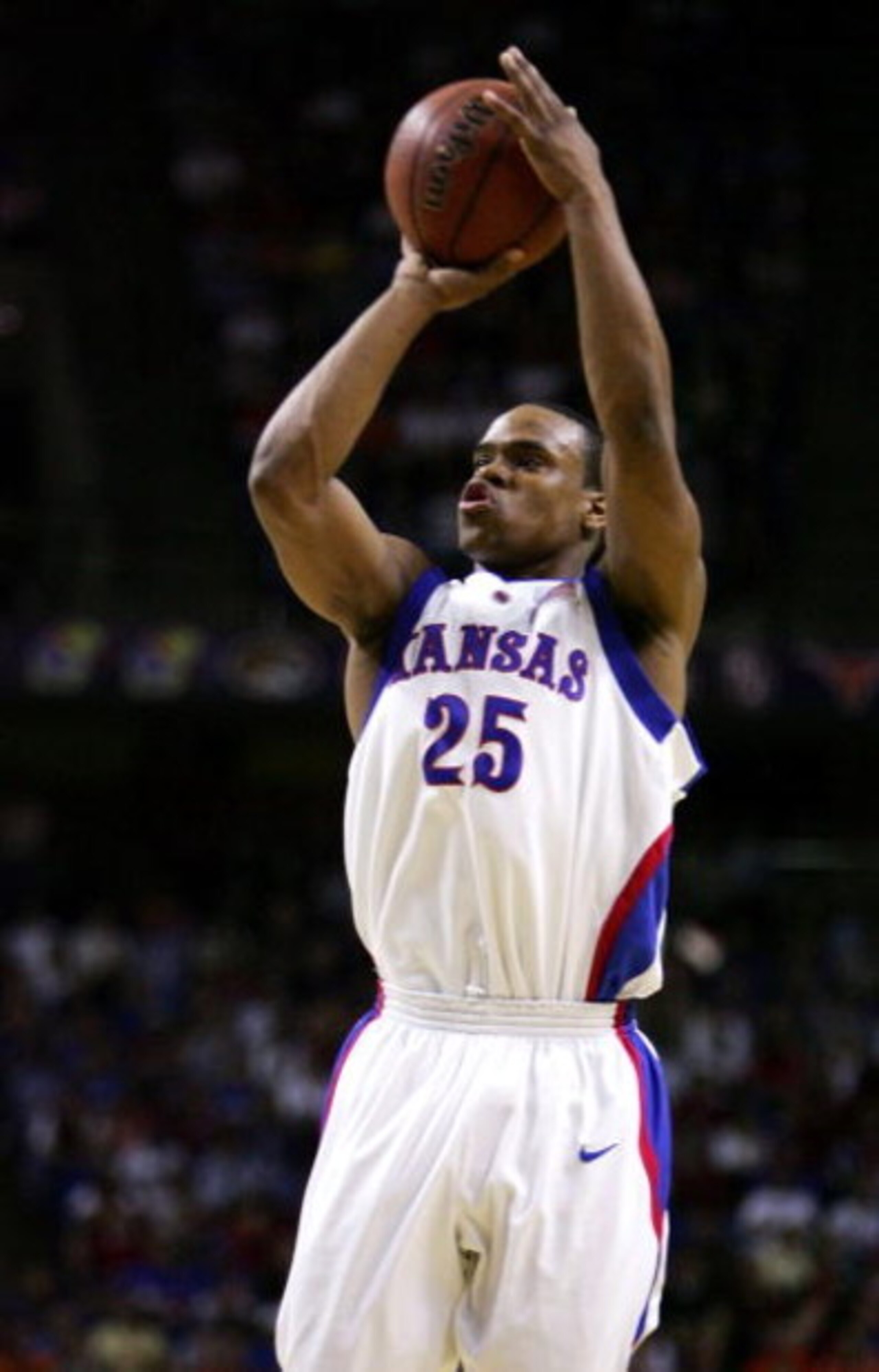 KANSAS CITY, MO - MARCH 12:  Michael Lee #25 of the Kansas Jayhawks shoots a jumper in the first half against the Oklahoma State Cowboys in the Semifinals of the Phillips 66 Big 12 Men's Basketball Tournament at Kemper Arena on March 12, 2005 in Kansas Ci