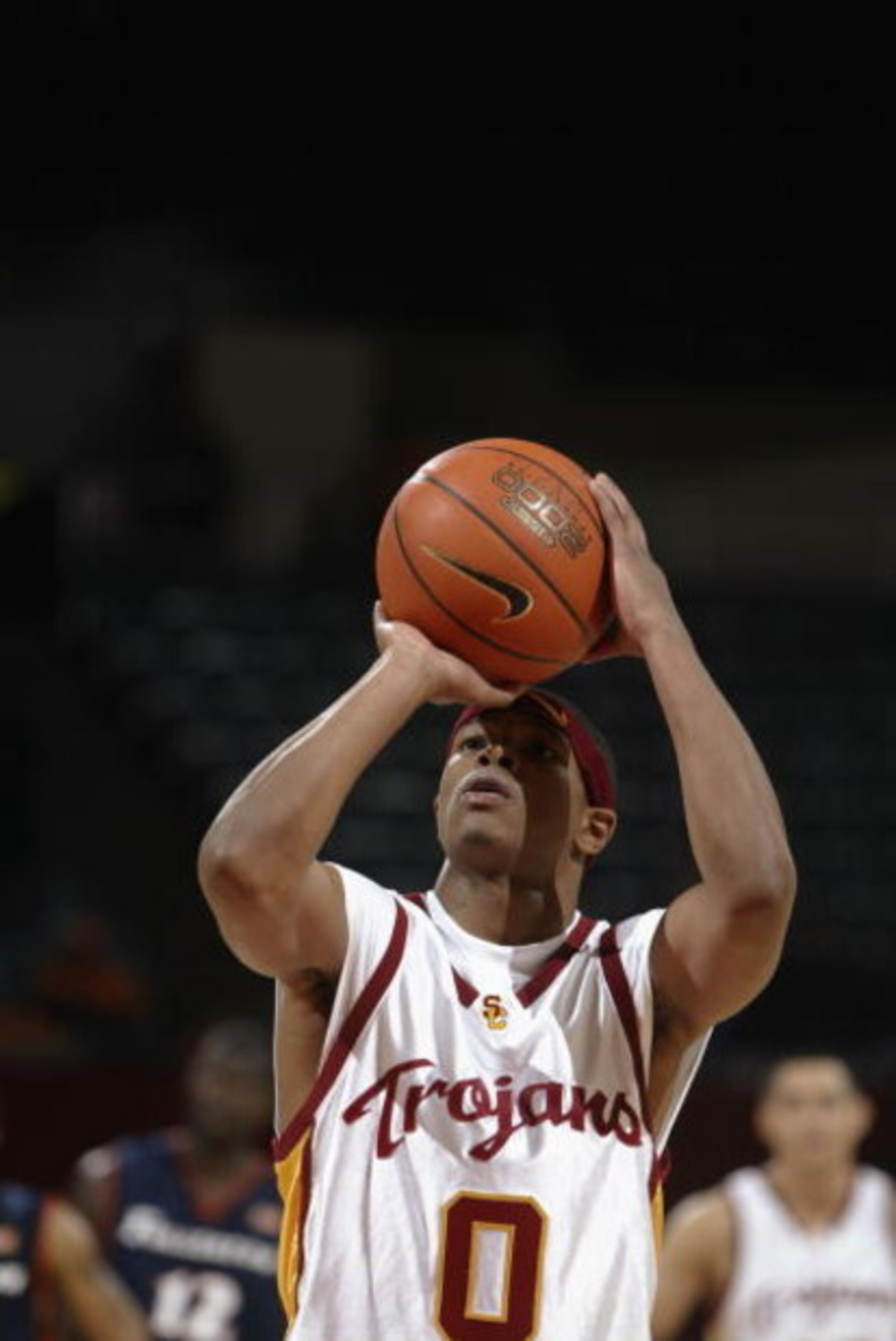 LOS ANGELES - DECEMBER 11:  Brandon Brooks #0 of USC shoots a free throw against Cal State Fullerton during the game on December 11, 2002 at the Sports Arena in Los Angeles, California.  USC won 78-63.  (Photo by Jeff Gross/Getty Images)