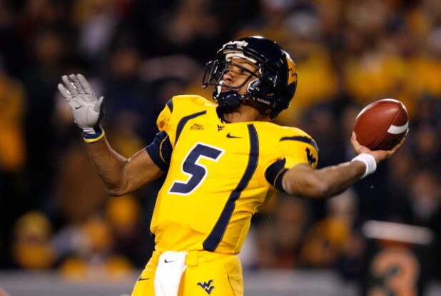 MORGANTOWN, WV - DECEMBER 1:  Quarterback Patrick White #5 of the West Virginia Mountaineers passes the ball before getting injured against the Pittsburgh Panthers during the first half at Milan Puskar Stadium December 1, 2007 in Morgantown, West Virginia