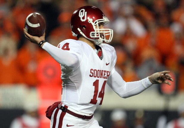 STILLWATER, OK - NOVEMBER 29:  Quarterback Sam Bradford #14 of the Oklahoma Sooners drops back to pass against the Oklahoma State Cowboys at Boone Pickens Stadium on November 29, 2008 in Stillwater, Oklahoma.  (Photo by Ronald Martinez/Getty Images)
