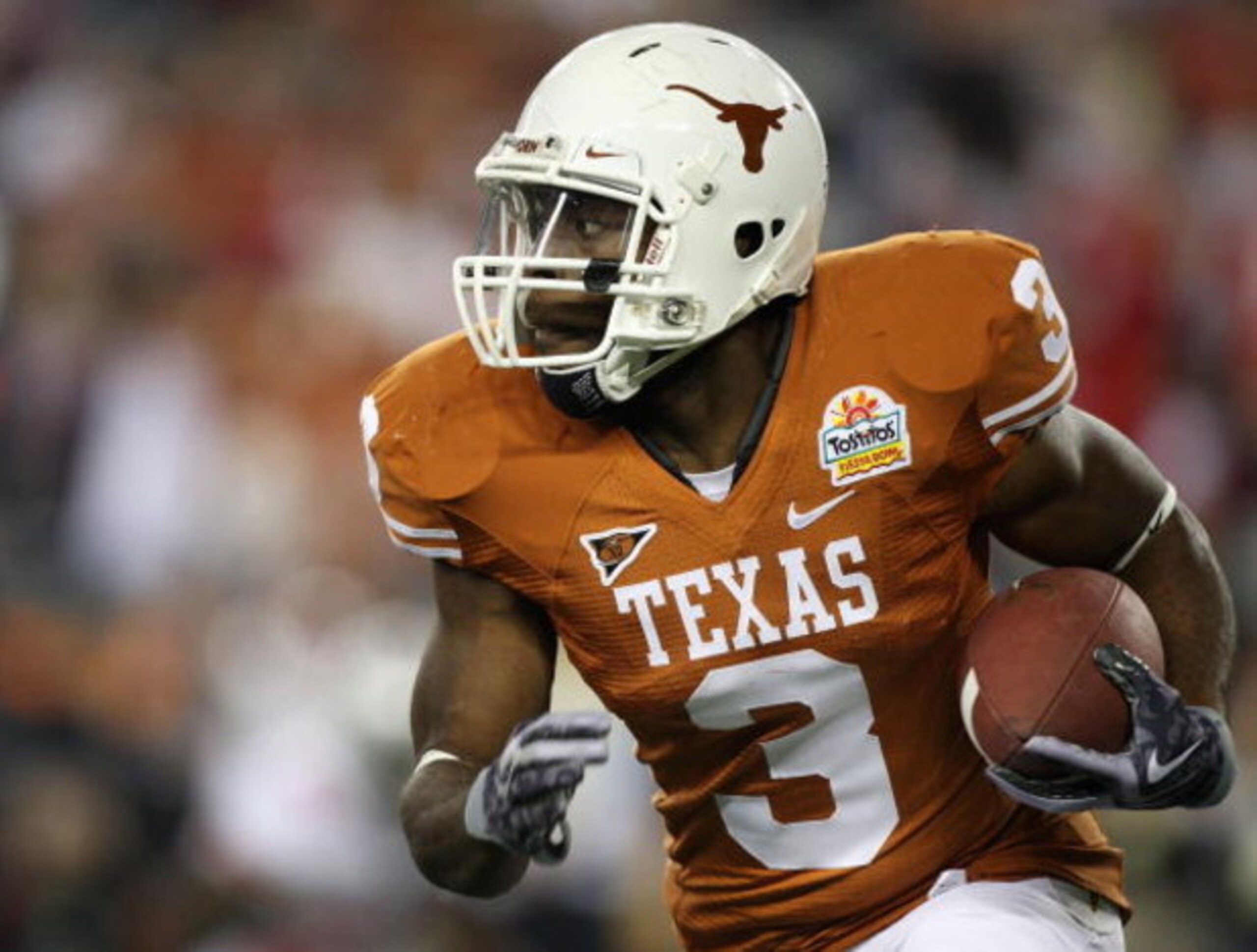 GLENDALE, AZ - JANUARY 05:  Runningback Chris Ogbonnaya #3 of the Texas Longhorns rushes the ball during the Tostitos Fiesta Bowl Game against the Ohio State Buckeyes on January 5, 2009 at University of Phoenix Stadium in Glendale, Arizona.  (Photo by Jed