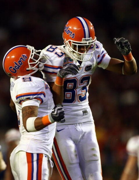 MIAMI - JANUARY 08:  David Nelson #83 and Louis Murphy #9 of the Florida Gators celebrate after a play against the Oklahoma Sooners in the FedEx BCS National Championship Game at Dolphin Stadium on January 8, 2009 in Miami, Florida.  (Photo by Donald Mira