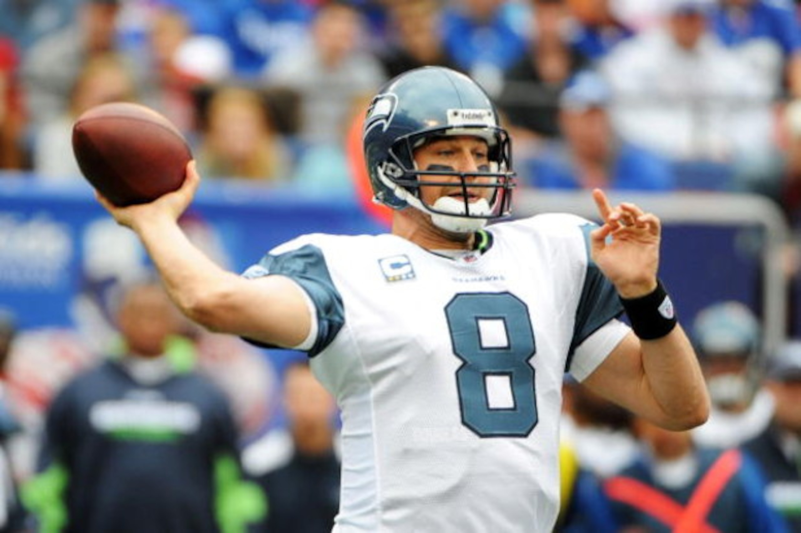 EAST RUTHERFORD, NJ - OCTOBER 05:  Matt Hasselback #8 of the Seattle Seahawks passes against the New York Giants during their game on October 5, 2008 at Giants Stadium in East Rutherford, New Jersey.  (Photo by Al Bello/Getty Images)