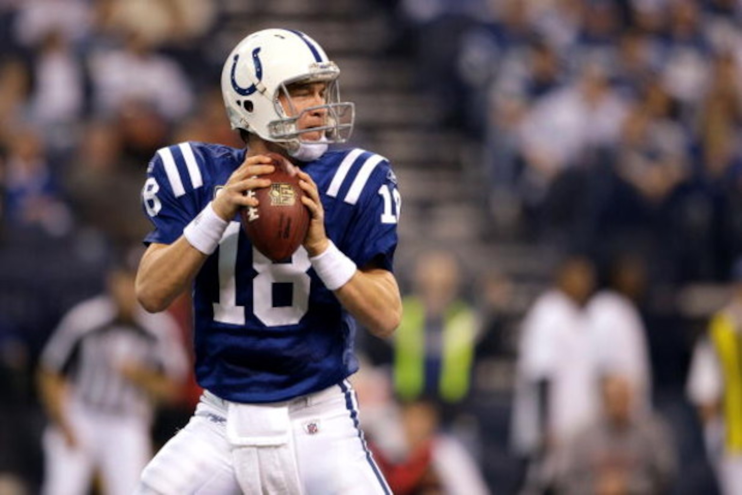 INDIANAPOLIS - DECEMBER 07:  Peyton Manning #18 of the Indianapolis Colts looks to throw a pass against the Cincinnati Bengals at Lucas Oil Stadium on December 7, 2008 in Indianapolis, Indiana.  (Photo by Andy Lyons/Getty Images)
