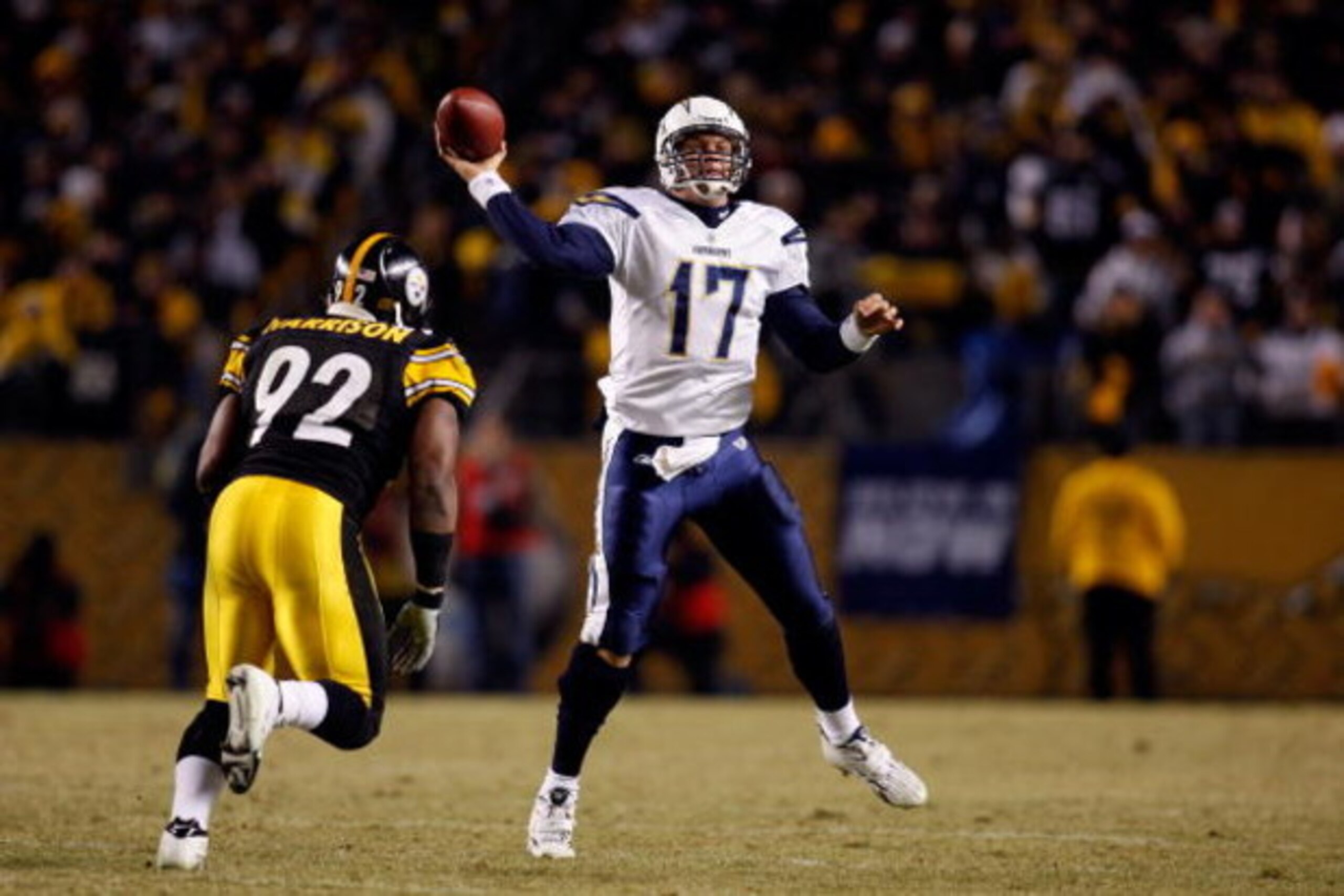 PITTSBURGH - JANUARY 11:  Philip Rivers #17 of the San Diego Chargers throws a pass against James Harrison #92 of the Pittsburgh Steelers during their AFC Divisional Playoff Game on January 11, 2009 at Heinz Field in Pittsburgh, Pennsylvania.  (Photo by C
