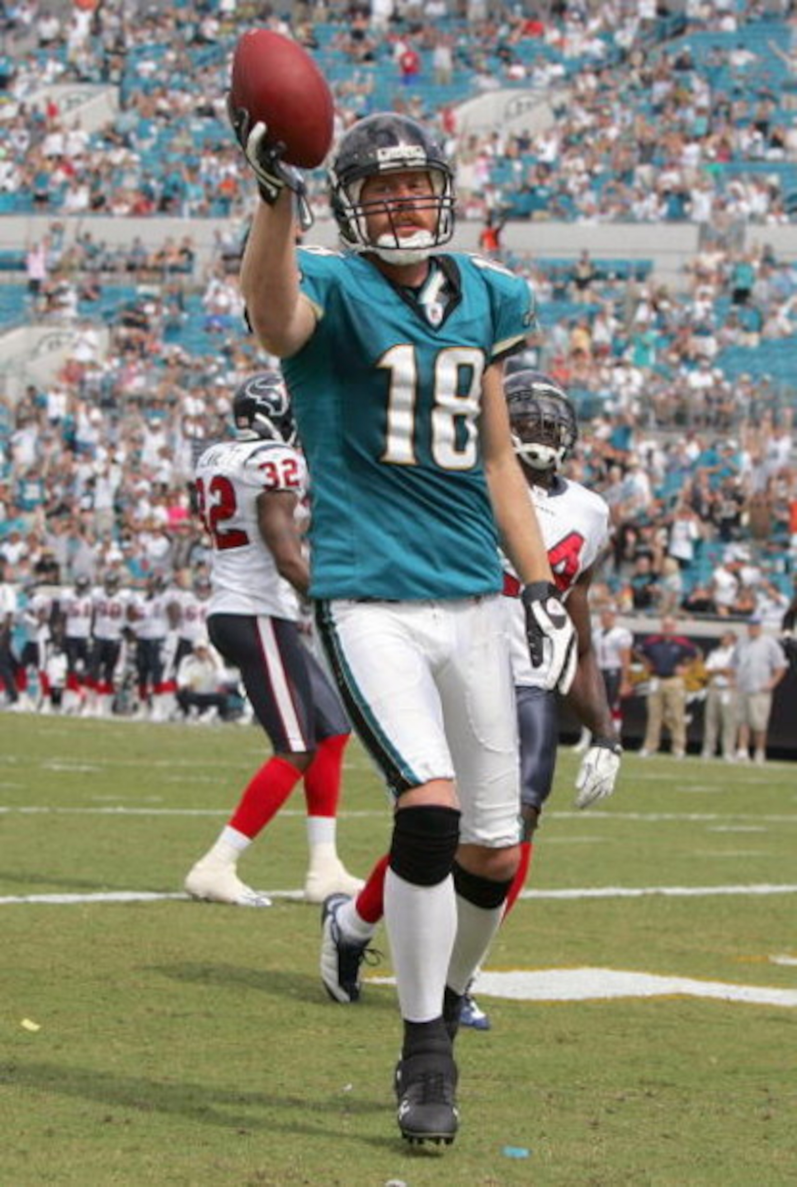 JACKSONVILLE, FL - SEPTEMBER 28:  Matt Jones #18 of the Jacksonville Jaguars celebrates his touchdown during the game against the Houston Texans at Jacksonville Municipal Stadium on September 28, 2008 in Jacksonville, Florida.  (Photo by Sam Greenwood/Get