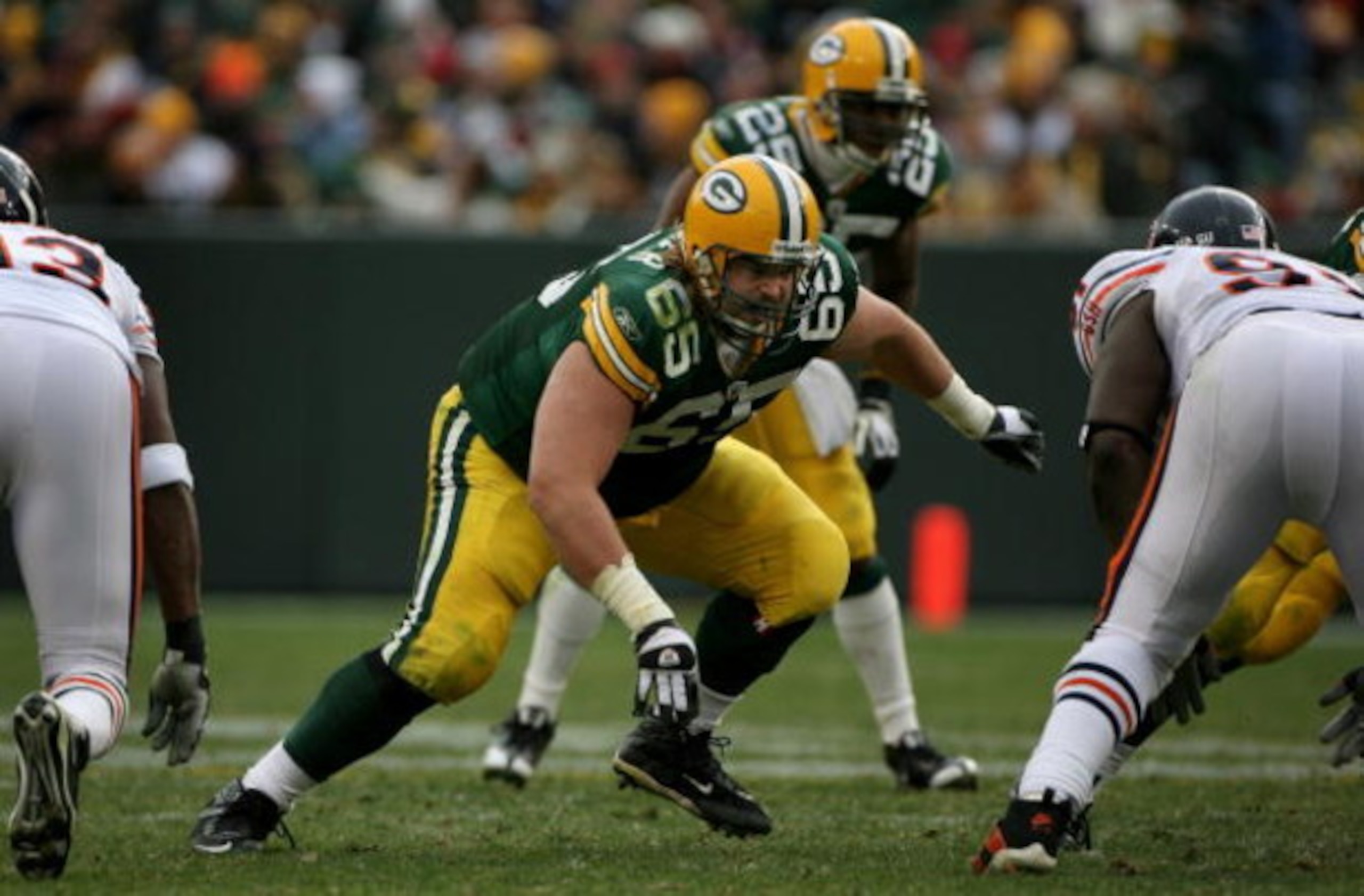 GREEN BAY, WI - NOVEMBER 16:  Offensive tackle Mark Tauscher #65 of the Green Bay Packers protects the line of scrimmage against the Chicago Bears during NFL action at Lambeau Field on November 16, 2008 in Green Bay, Wisconsin. The Packers defeated the Be