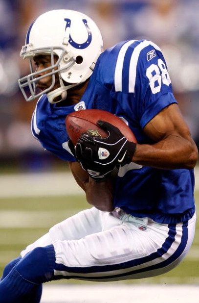 INDIANAPOLIS - DECEMBER 28: Receiver Marvin Harrison #88 of the Indianapolis Colts makes a catch during the game against the Tennessee Titans at Lucas Oil Stadium December 28, 2008 in Indianapolis, Indiana. (Photo by Jamie Squire/Getty Images) INDIANAPOLIS - DECEMBER 28: Receiver Marvin Harrison #88 of the Indianapolis Colts makes a catch during the game against the Tennessee Titans at Lucas Oil Stadium December 28, 2008 in Indianapolis, Indiana. (Photo by Jamie Squire/Getty Images)
