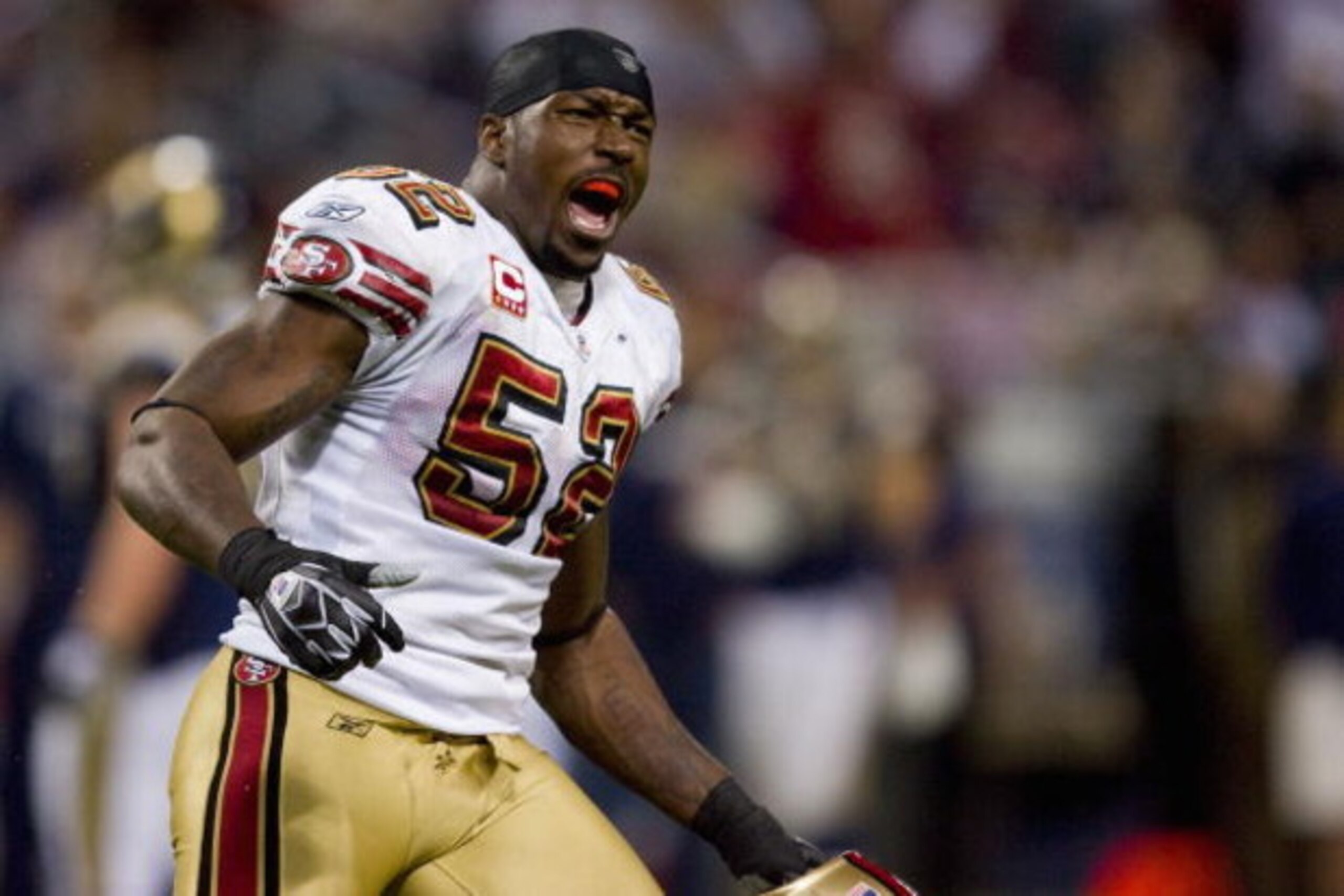 ST. LOUIS, MO - DECEMBER 21: Patrick Willis #52 of the San Francisco 49ers celebrates a victory against the St. Louis Rams at the Edward Jones Dome on December 21, 2008 in St. Louis, Missouri.  The 49ers beat the Rams 17-16.  (Photo by Dilip Vishwanat/Get