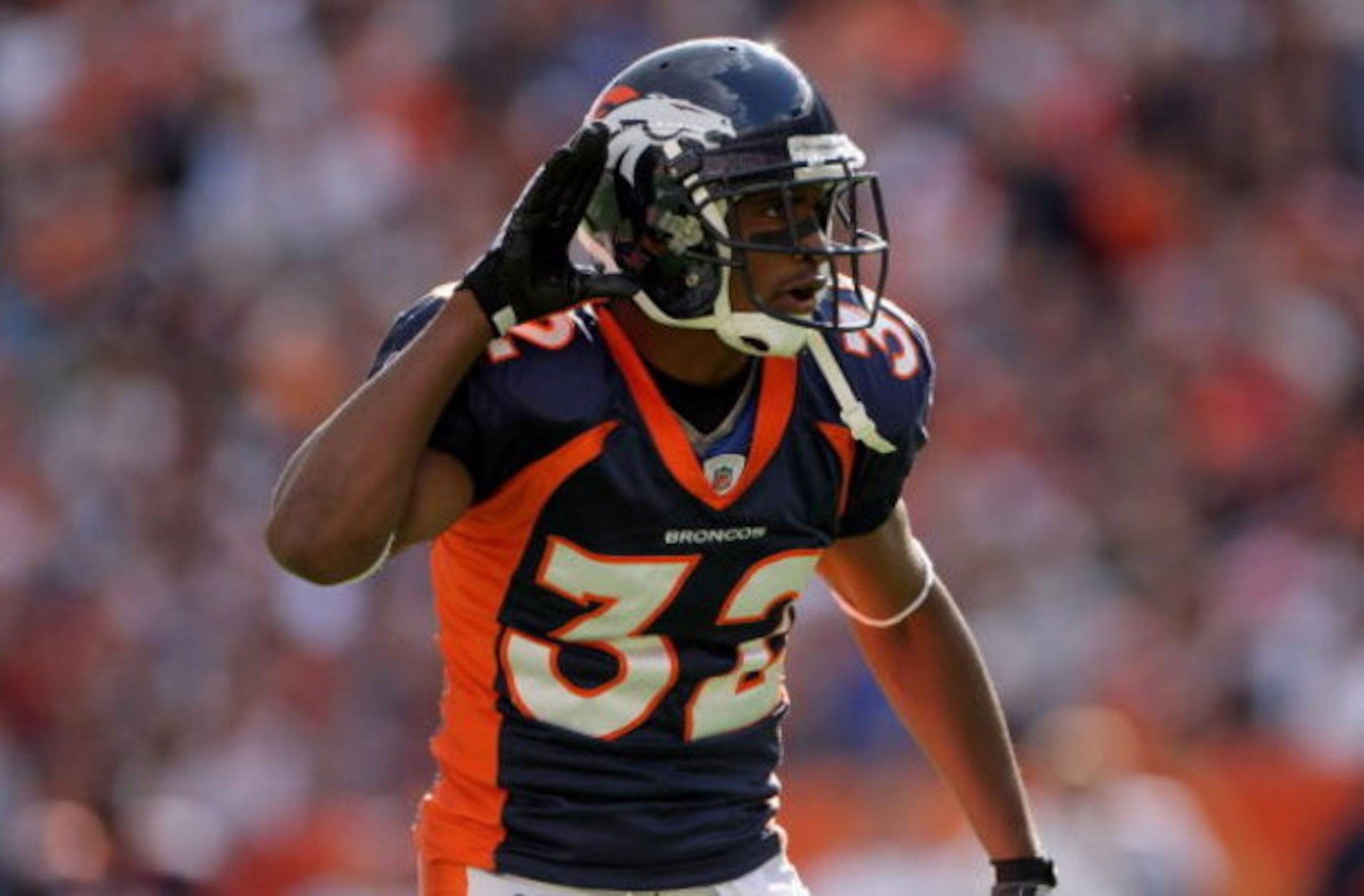 DENVER - OCTOBER 05:  Cornerback Dre Bly #32 of the Denver Broncos encourages the crowd against the Tampa Bay Buccaneers during NFL action on October 5, 2008 in Denver, Colorado. The Broncos defeated the Buccaneers 16-13.  (Photo by Doug Pensinger/Getty I
