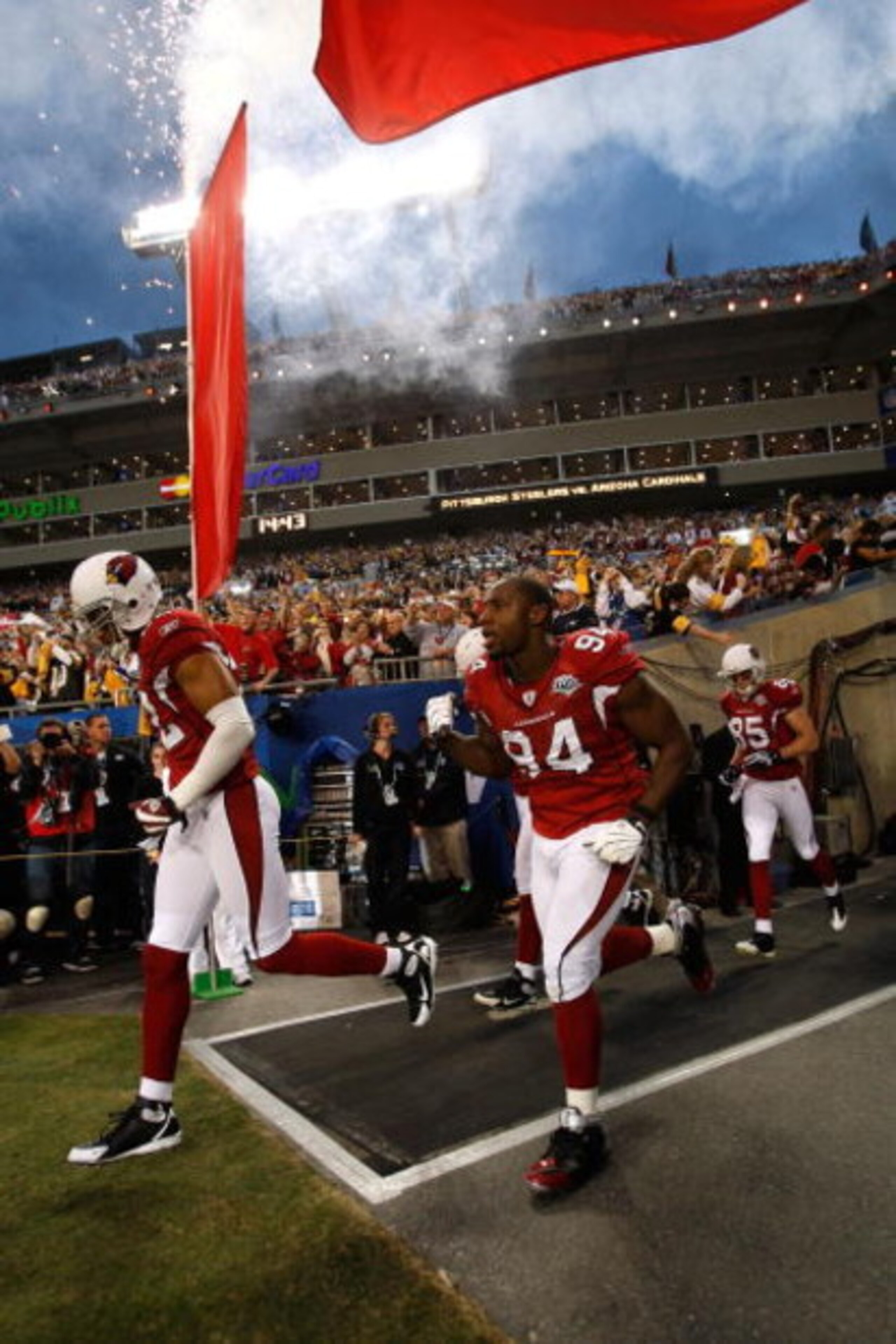 TAMPA, FL - FEBRUARY 01:  (L-R) Matt Ware #22 and Antonio Smith #94 of the Arizona Cardinals take the field against the Pittsburgh Steelers during Super Bowl XLIII on February 1, 2009 at Raymond James Stadium in Tampa, Florida. Steelers won 27-24.  (Photo