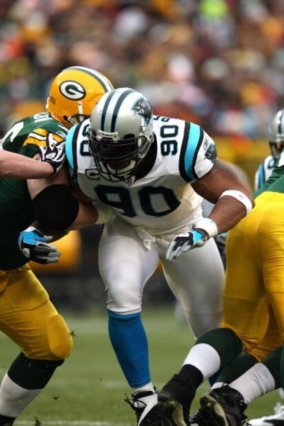 GREEN BAY, WI - NOVEMBER 30:  Julius Peppers #90 of the Carolina Panthers rushes the passer against the Green Bay Packers at Lambeau Field on November 30, 2008 in Green Bay, Wisconsin. The Panthers won 35-31.  (Photo by Jonathan Daniel/Getty Images)