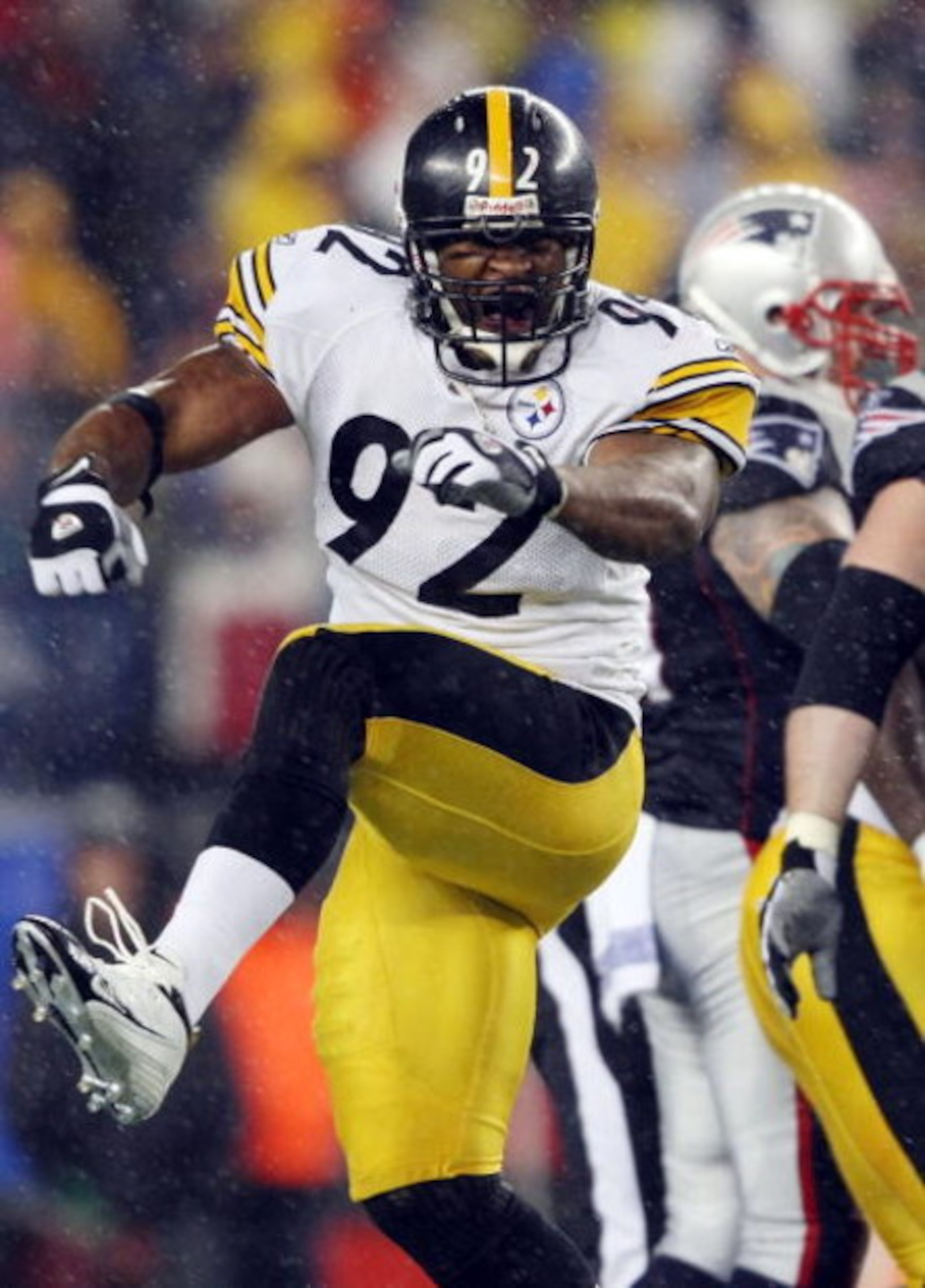 FOXBORO, MA - NOVEMBER 30:  James Harrison #92 of the Pittsburgh Steelers celebrates after the Steelers recovered a fumble by the New England Patriots on November 30, 2008 at Gillette Stadium in Foxboro, Massachusetts.  (Photo by Elsa/Getty Images)