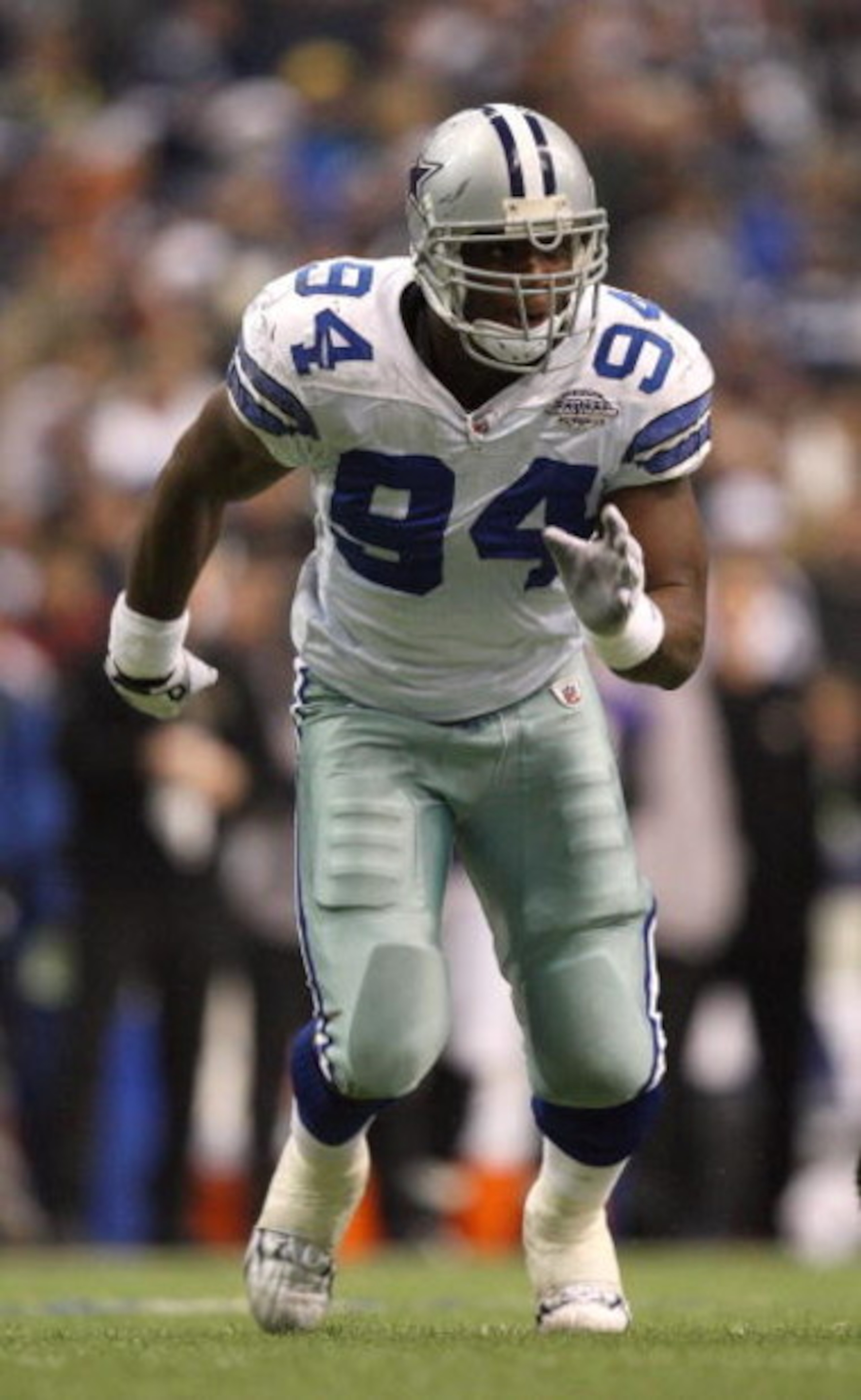 IRVING, TX - DECEMBER 20:  DeMarcus Ware #94 of the Dallas Cowboys rushes the passer from the right side of the defense during their NFL game against the Baltimore Ravens at Texas Stadium on December 20, 2008 in Irving, Texas. The Ravens defeated the Cowb